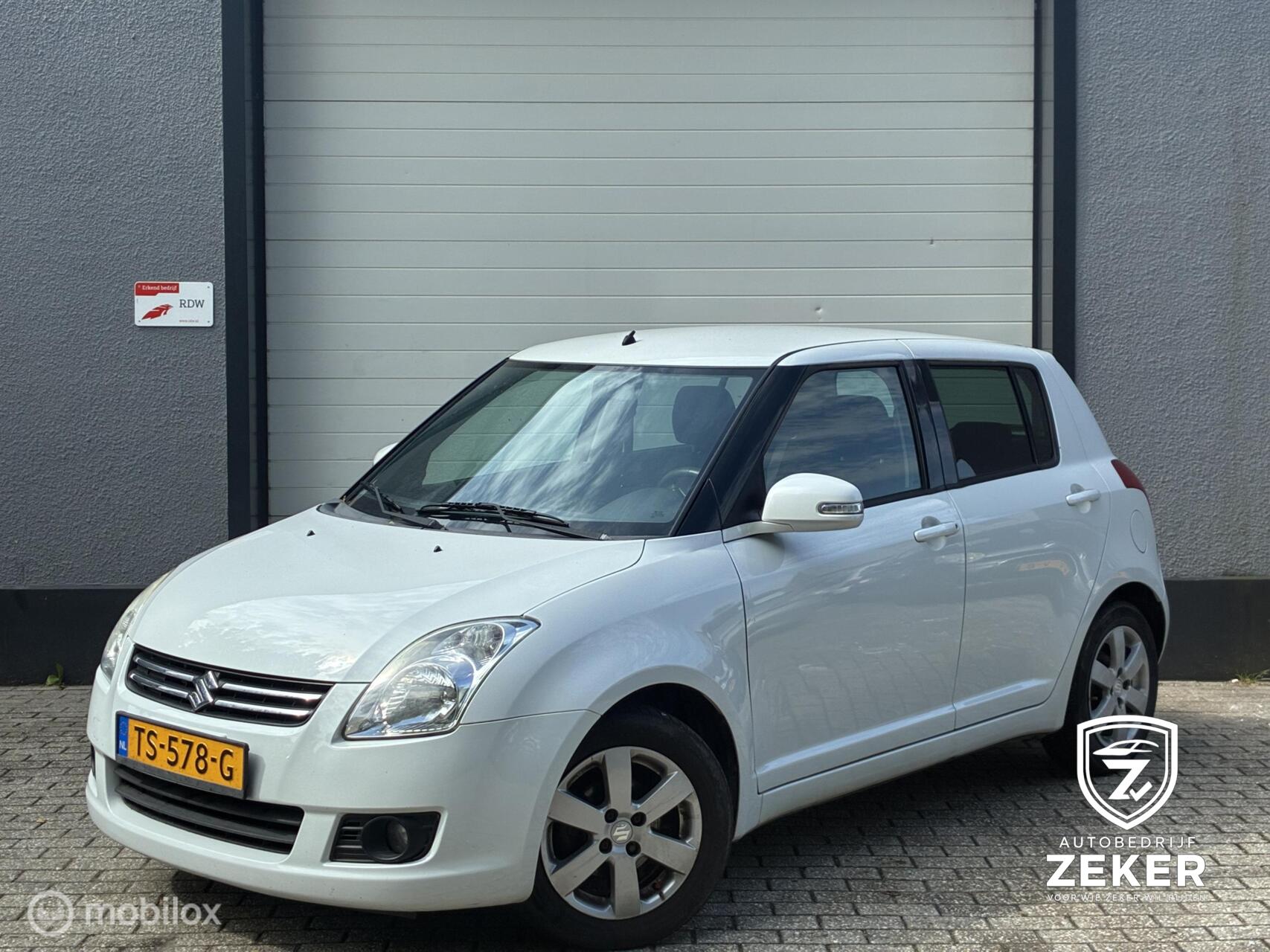 Suzuki Swift 1.3 Base / NIEUWE KOPPELING / NIEUWE APK / 2009 - voorkant