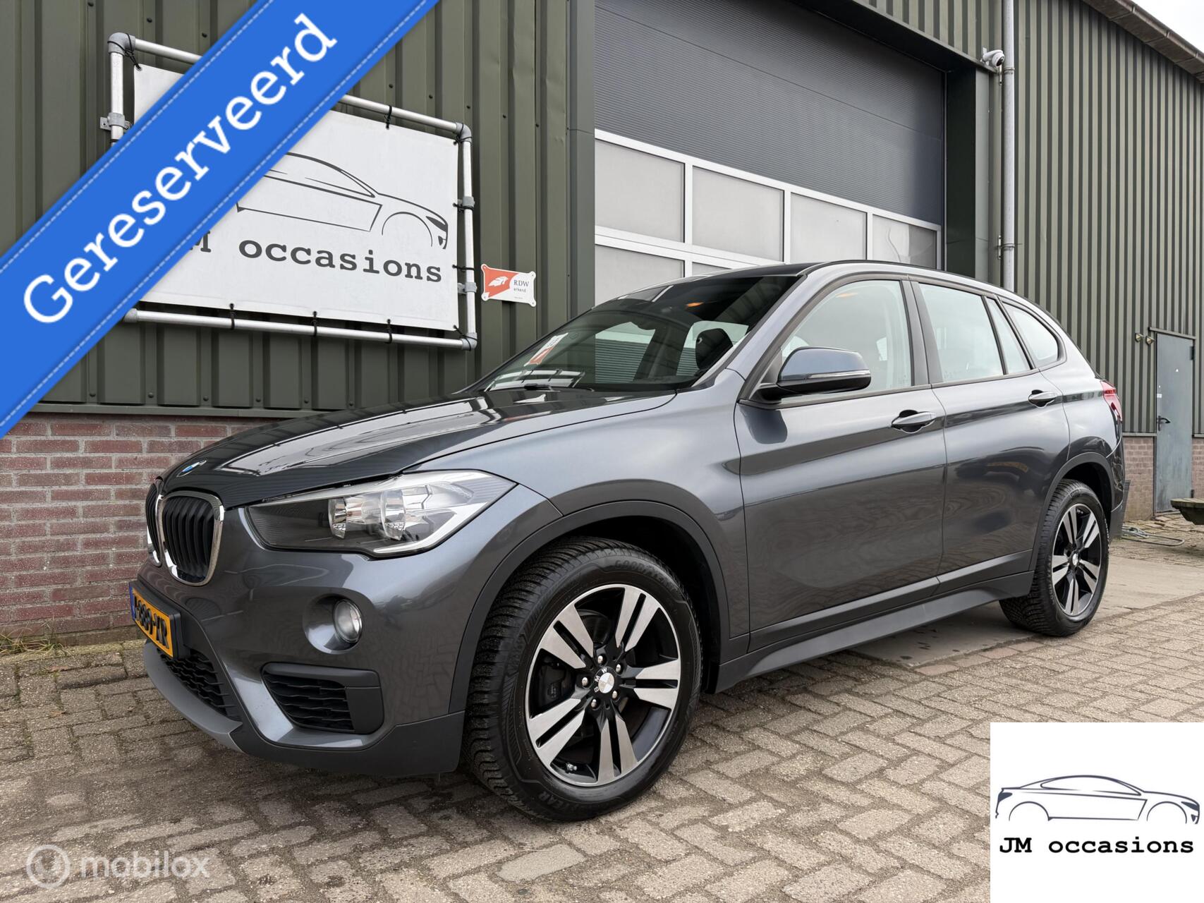BMW X1 Sdrive18i sDrive18i Centennial High Executive|Stoel vw|Clima|PDC| 2017 - voorkant