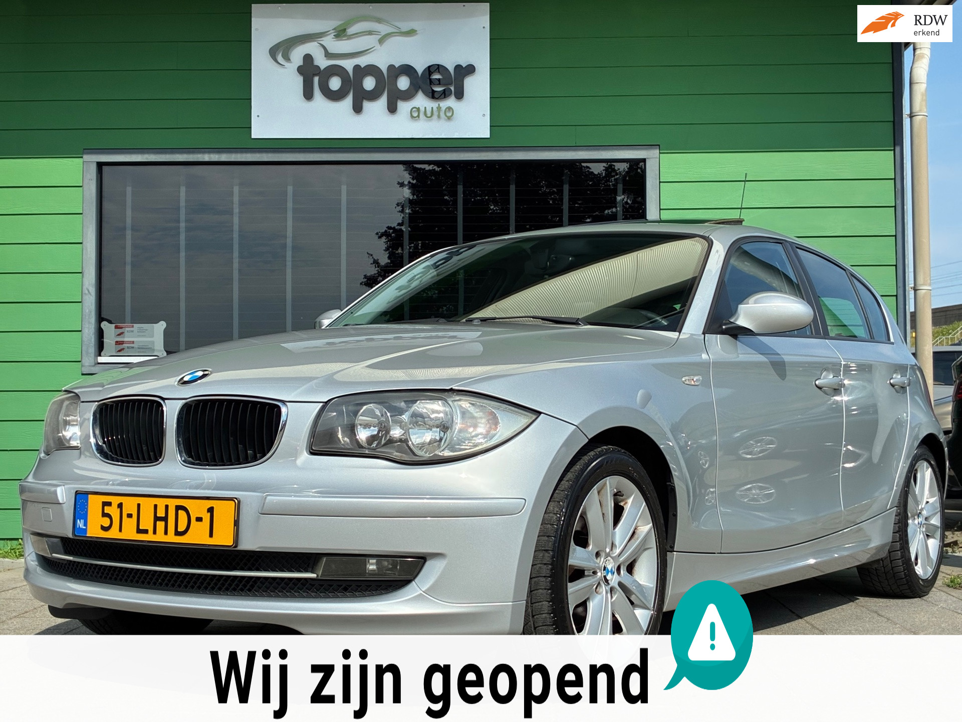 BMW 1er Reihe 118i Business Line|1e Eigenaar|Panoramadak|Navigatie|ClimateControl|Trekhaak 2009 - voorkant