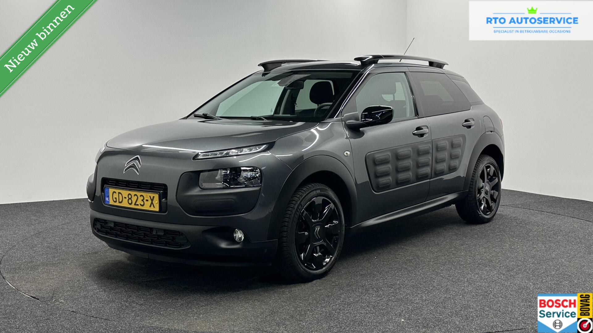 Citroen C4 Cactus 1.2 PureTech Shine PANO NAVI TREKHAAK CRUISE. 2015 - voorkant