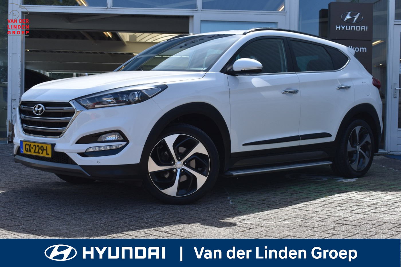 Hyundai Tucson 1.6 GDi Comfort Navi/Cam/19"/Pdc 2x/Winterp./Trekhaak "RIJKLAARP 2015 - voorkant