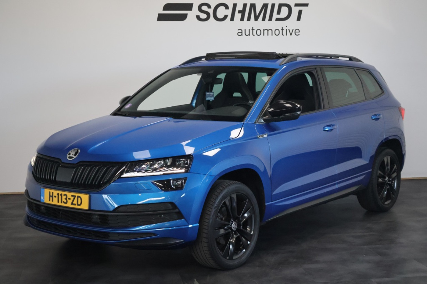 Skoda Karoq 1.5 TSI Sportline Business 150pk DSG | Trekhaak | Panoramadak 2020 - voorkant