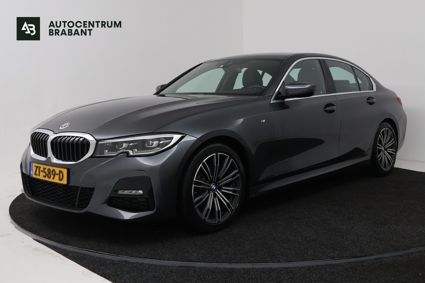 BMW 320i 320i High Executive Edition (STOELVERWARMING, CAMERA, PDC, SFEERVERLICHTING, TREKHAAK AFNEEMBAAR, DEALER ONDERHOUDEN) 2019 - voorkant