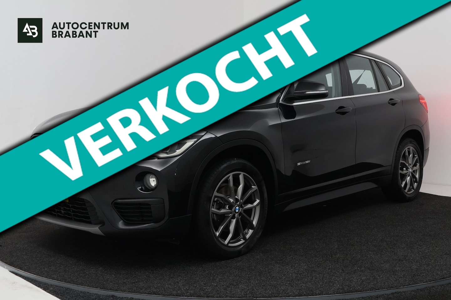 BMW X1 Sdrive18i SDrive18i Centennial Executive (CAMERA, NAVIGATIE, HEAD-UP DISPLAY, DEALER ONDERHOUDEN) 2016 - voorkant