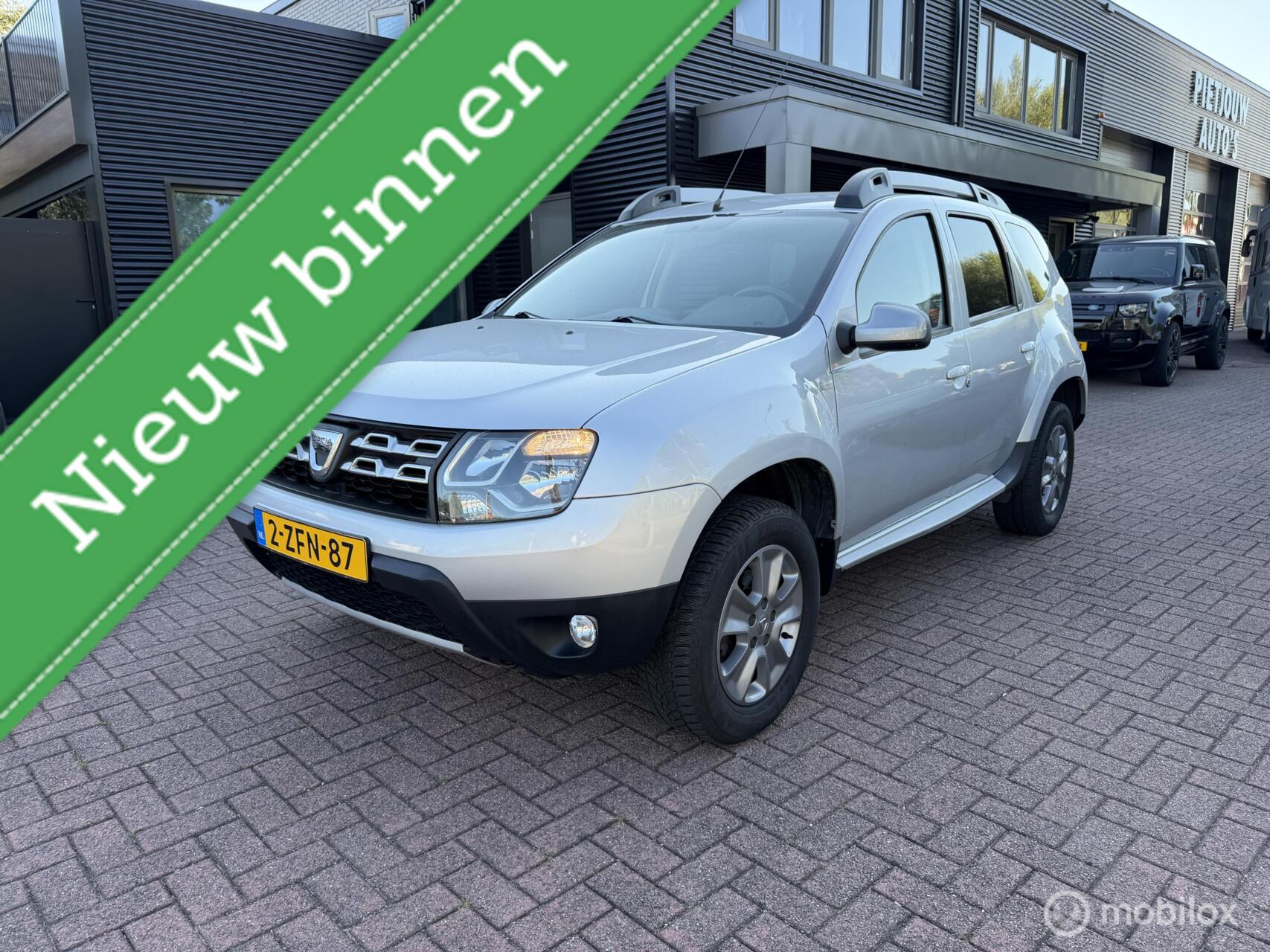 Dacia Duster 1.2 TCe 4x2 Prestige Airco Navigatie Trekh Nap 2015 - voorkant