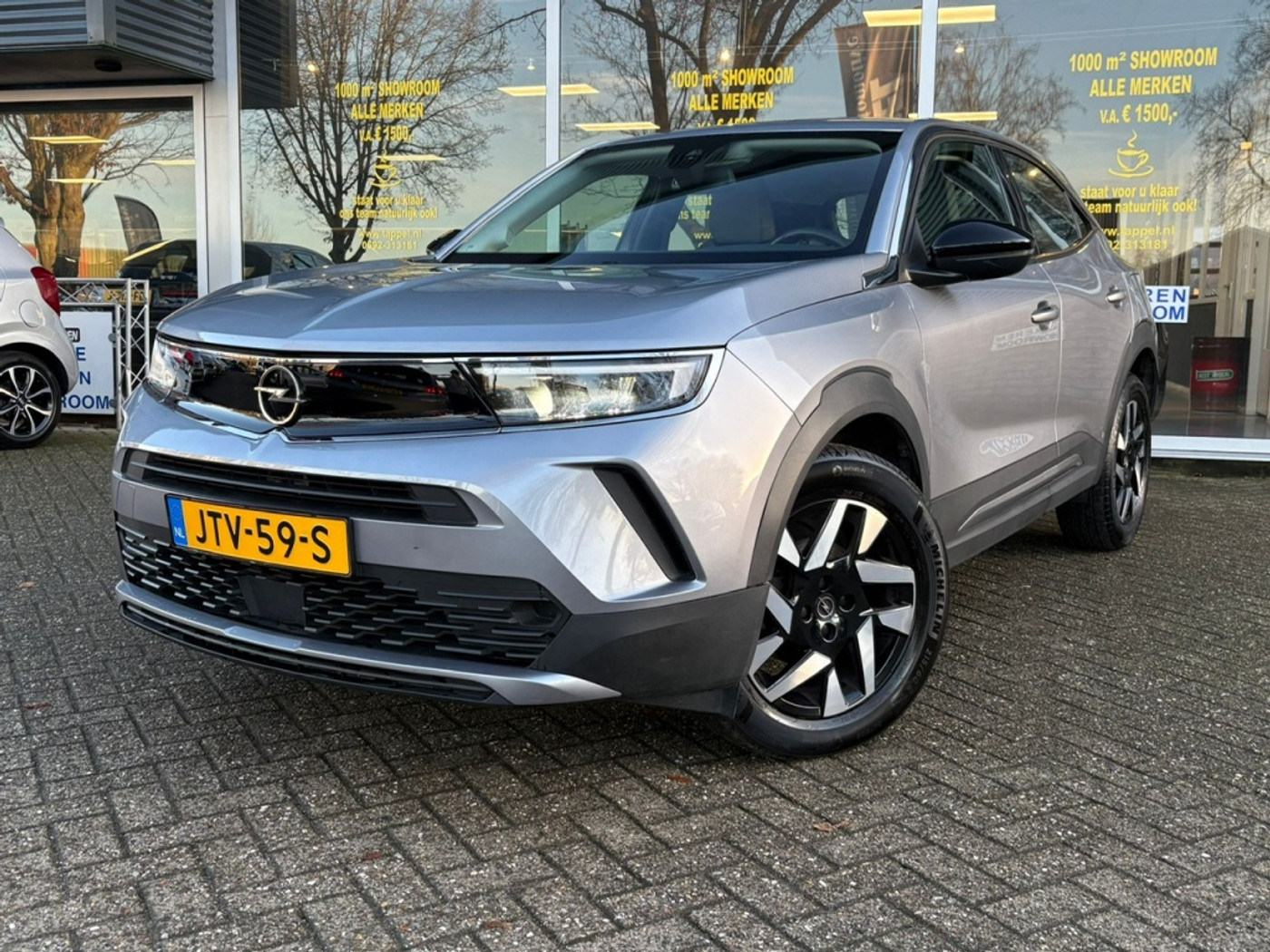 Opel Mokka 1.2 Turbo Elegance als nieuw, complete uitvoering. 2023 - voorkant