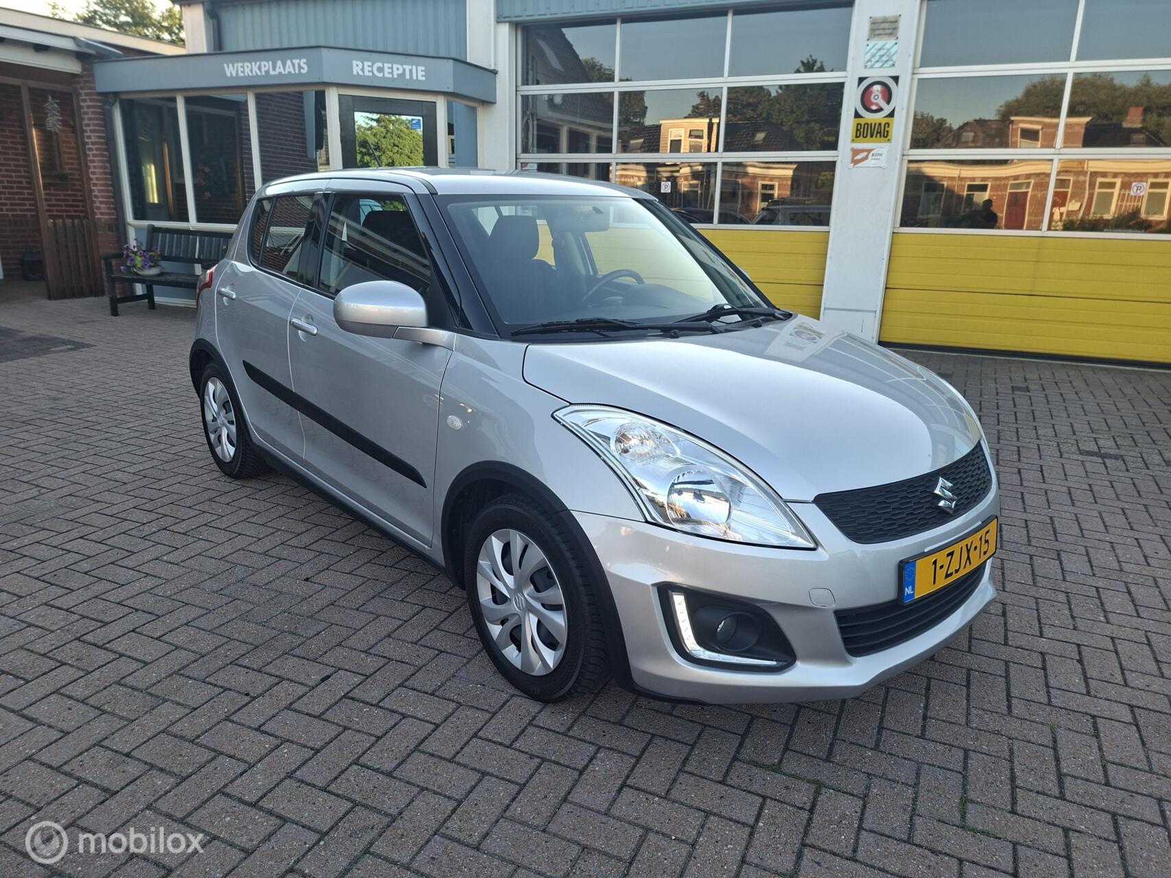 Suzuki Swift 1.2 Dynamic EASSS 2015 - voorkant
