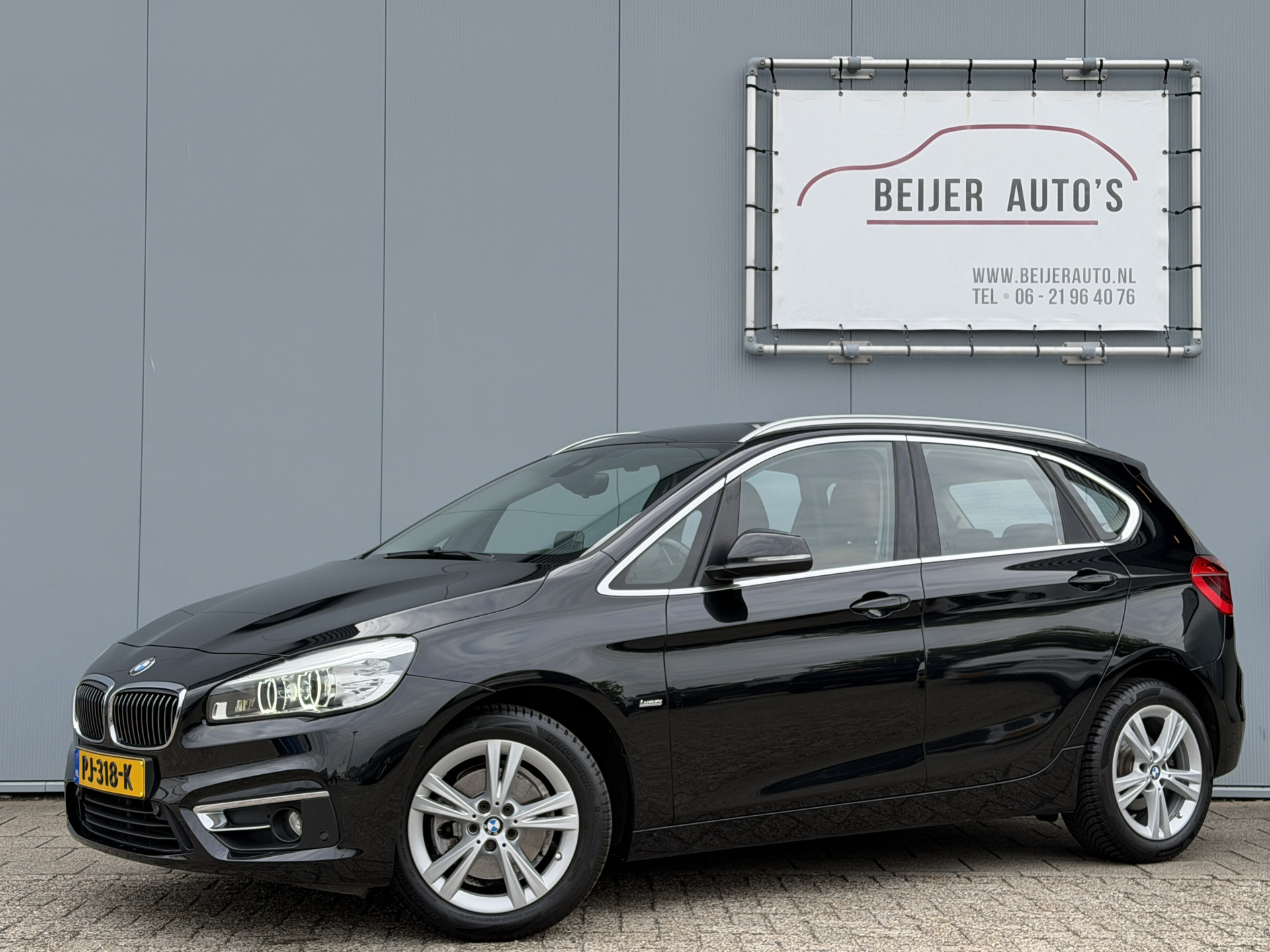 BMW 220i Active Tourer 220i High Executive Automaat 2017 - voorkant