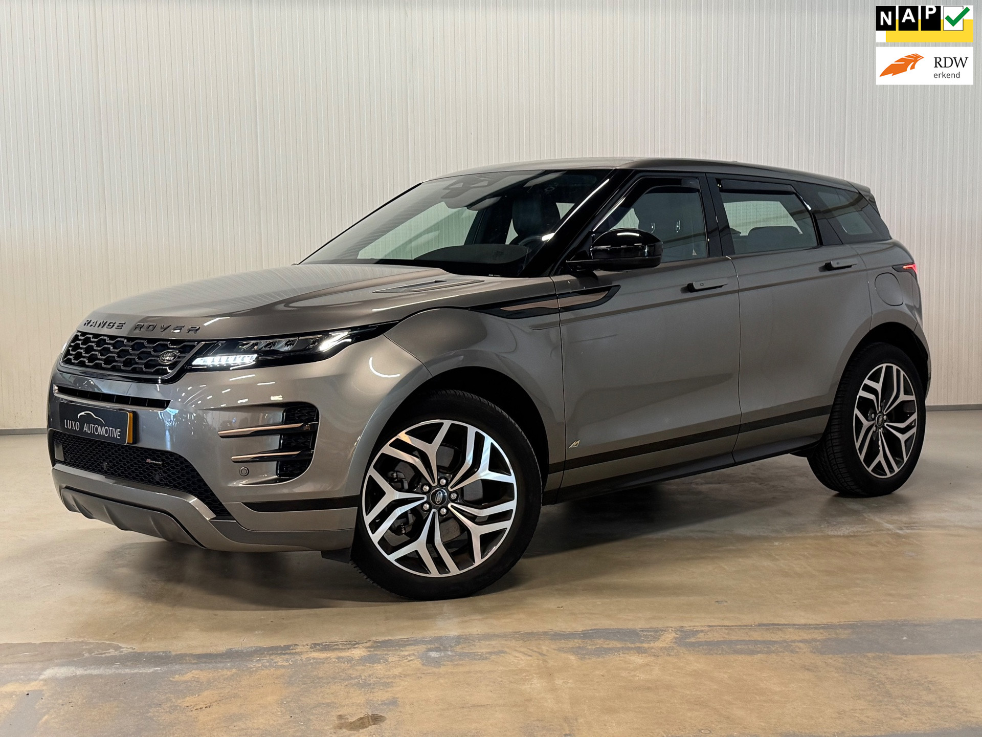Land Rover Range Rover Evoque 1.5 P300e PHEV AWD Dynamic SE | NAP | CAMERA | ZONNEDAK | LEDER 2023 - voorkant
