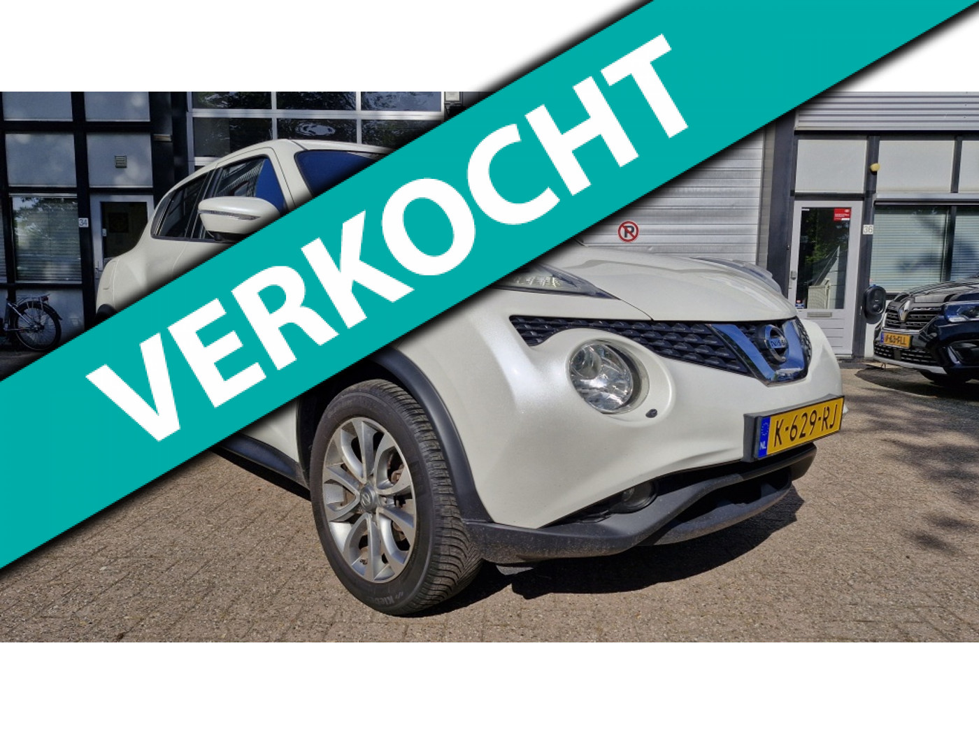 Nissan Nissan Juke 1.2 DIG-T S/S Tekna 2015 - voorkant