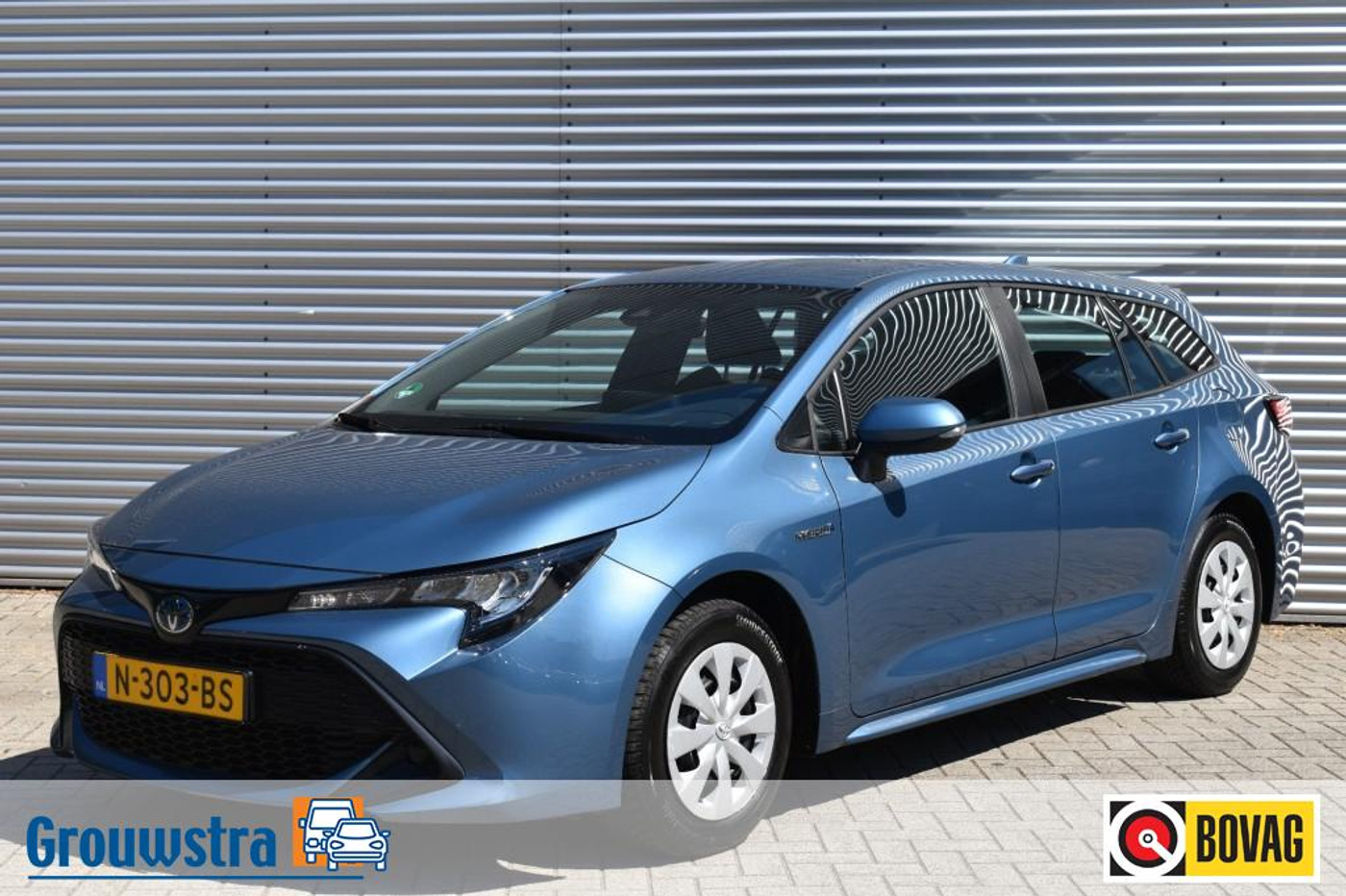 Toyota Toyota Corolla 1.8 HYBRID COMFORT / NAVIGATIE / TREKHAAK / CLIMA / 2021 - voorkant