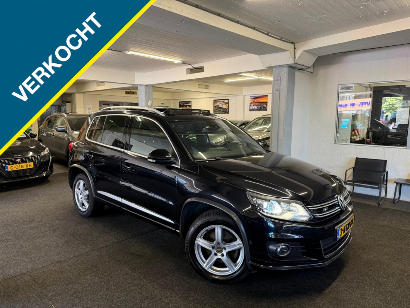 Volkswagen Tiguan 1.4 TSI Sport&Style R-line*Schuifdak*Camera*Alcantara 2013 - voorkant