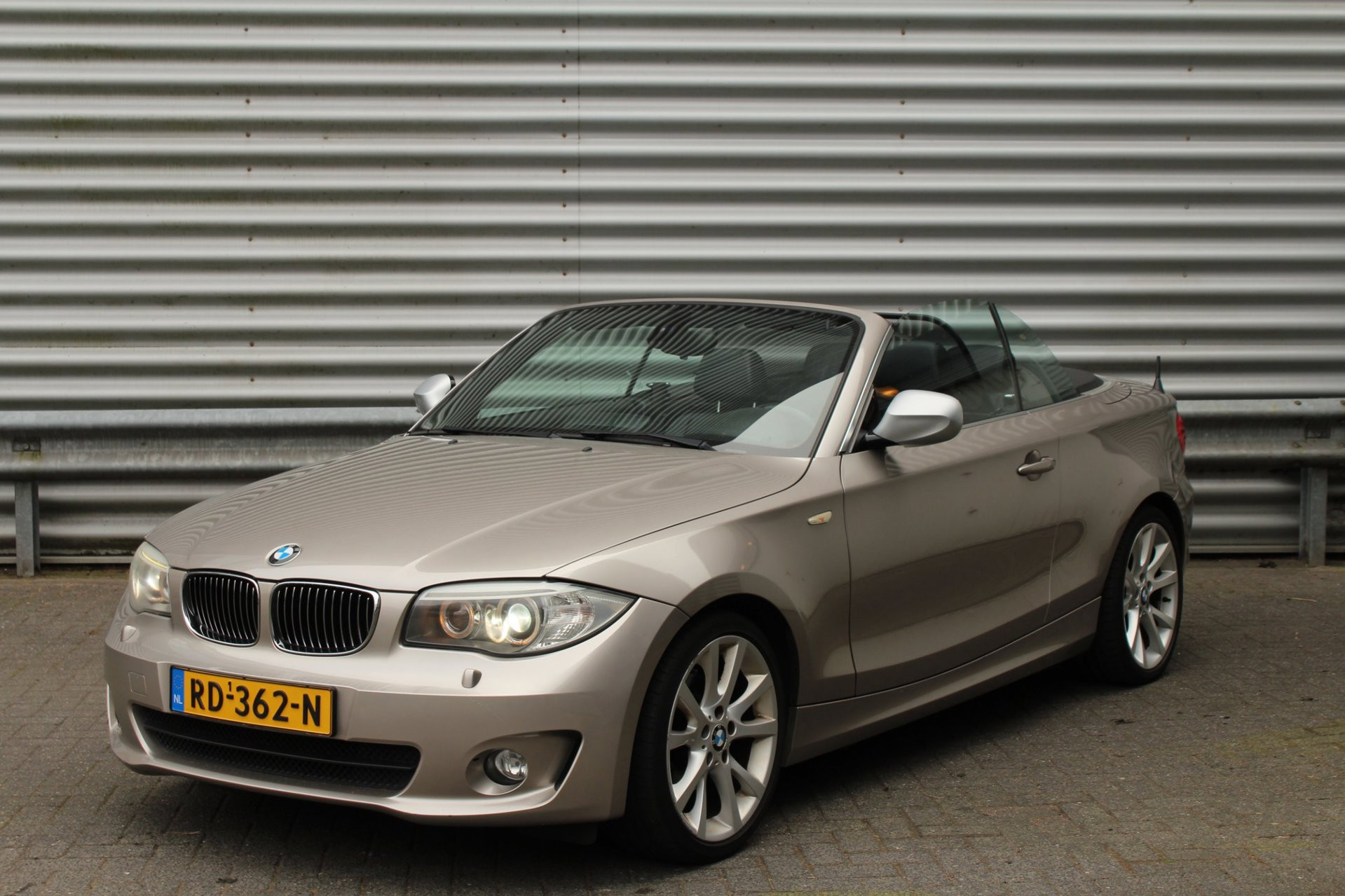 BMW 120i 120i 170pk High Executive AUTOMAAT 2012 - voorkant