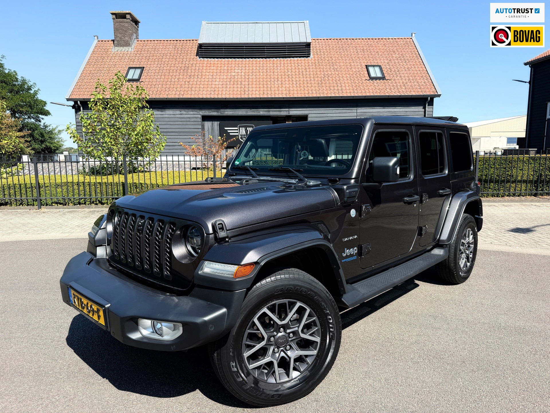 Jeep Wrangler Unlimited Jeep Wrangler 380 Unlimited/Sahara 2.0 PHEV Softtop AWD 4x4 Leer Navi Led-Xenon 2021 - voorkant
