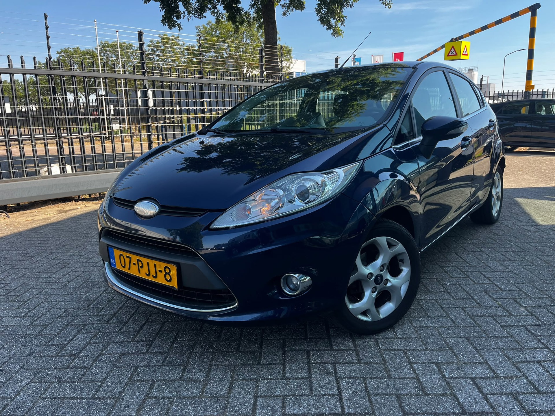 Ford Fiesta 1.25 Titanium (Airco, Digitiaal Scherm, Goed Onderhouden, NL-Auto) 2011 - voorkant