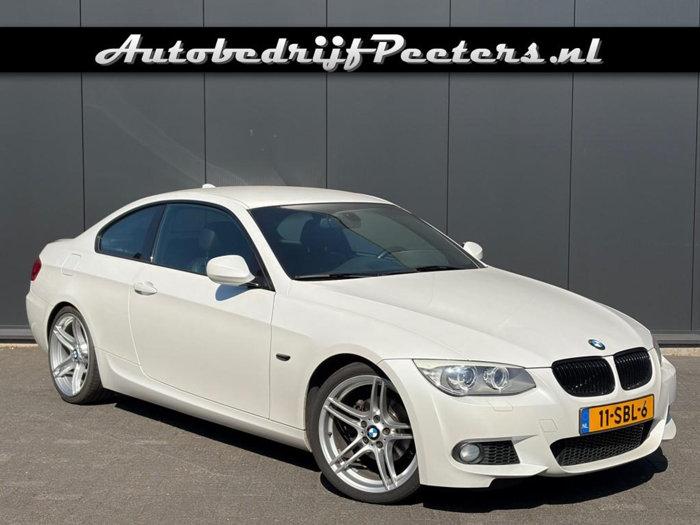 BMW 320i Coupe 320i M Sport 2e eig. NL-auto Xenon H/K Leder Navi 2011 - voorkant
