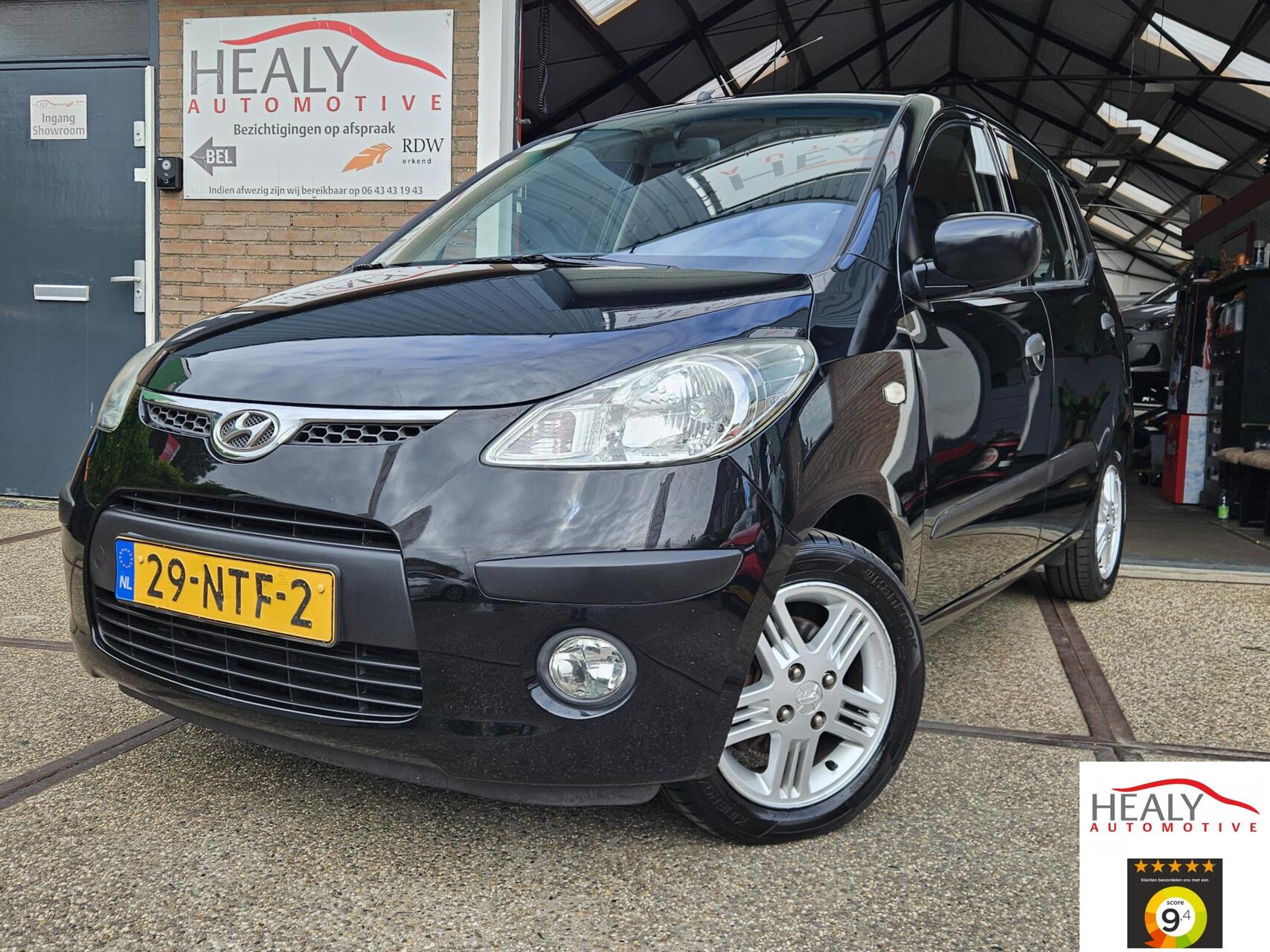 Hyundai I 10 1.1 Active Orange Babies|1ste eig|nap| 2010 - voorkant