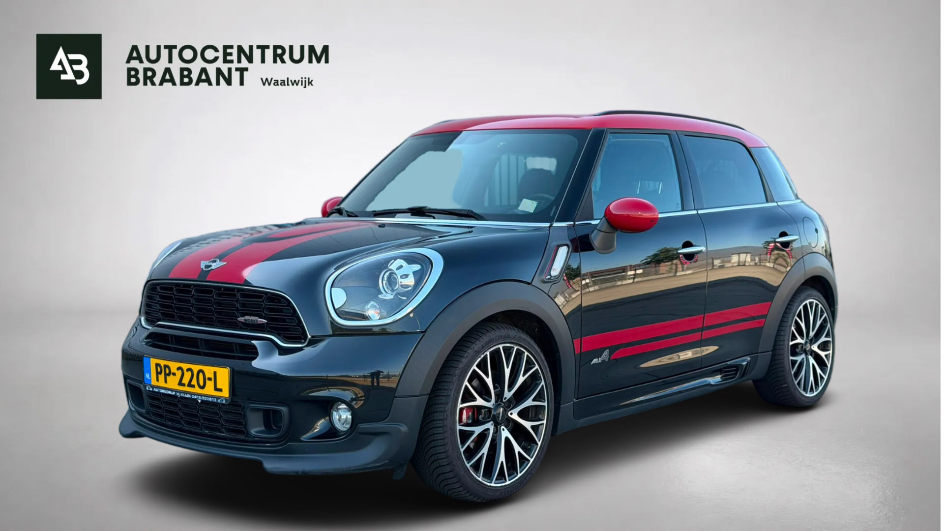 Mini John Cooper Works 1.6 John Cooper Works ALL4 LAGE KM!! | 218PK | PANO | HARMAN/KARDON | LEER | PERF ONDERHOUD | CRUISE | CLIMATE | 2014 - voorkant