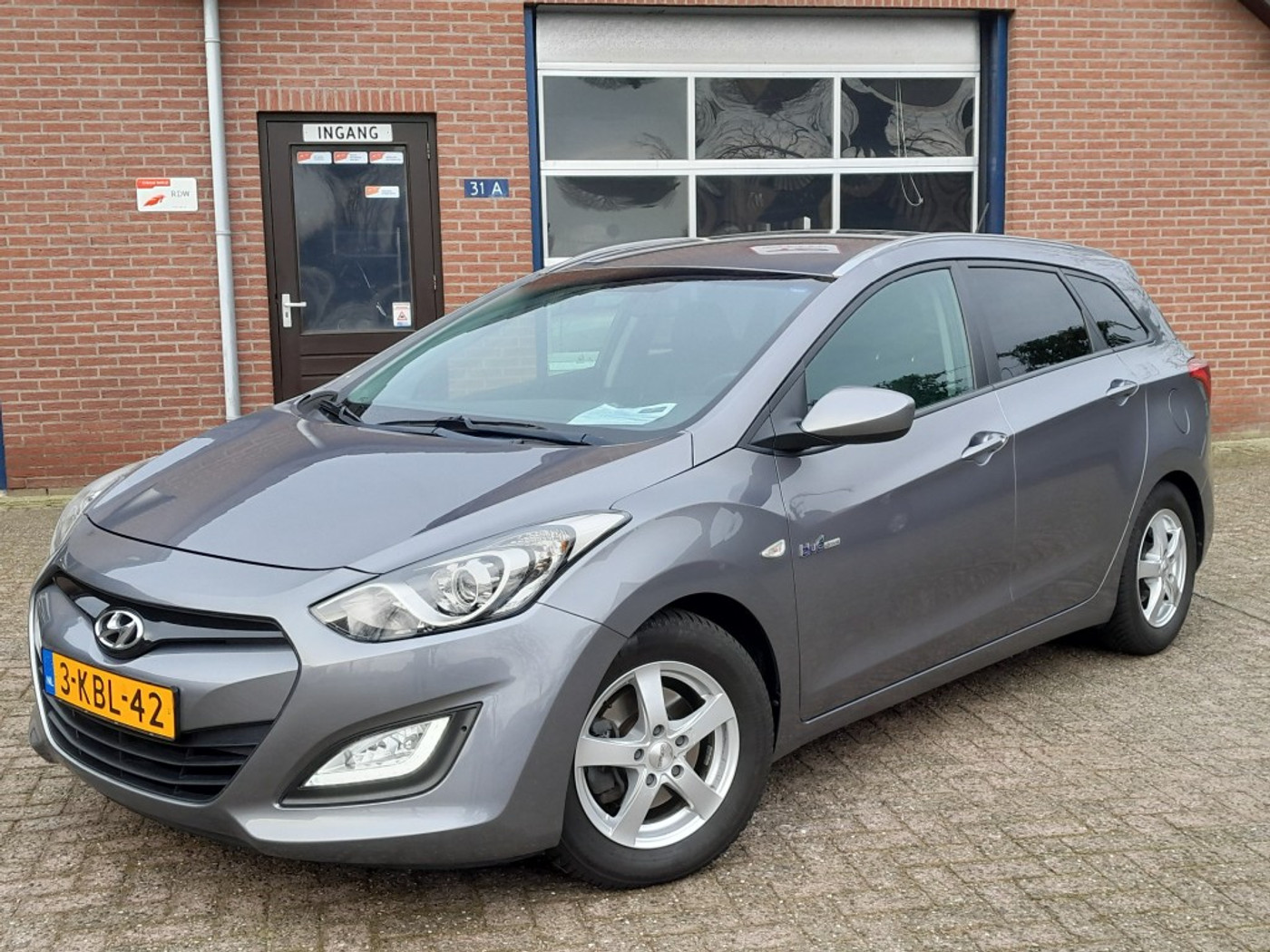 Hyundai I 30 1.6 GDI Wagon i-Motion NL-auto Airco Cruise Trekhaak 2013 - voorkant