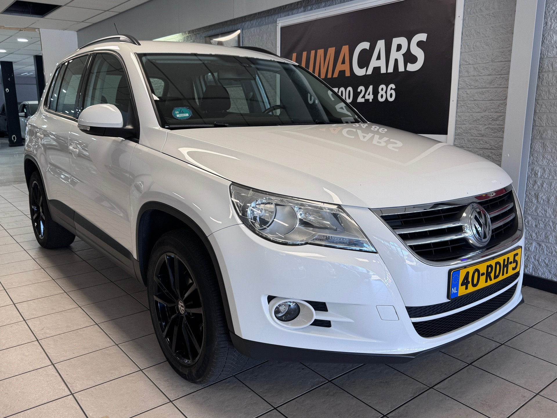 Volkswagen Tiguan 1.4 TSI Comfort&Design| Nieuwe APK |Camera 2011 - voorkant