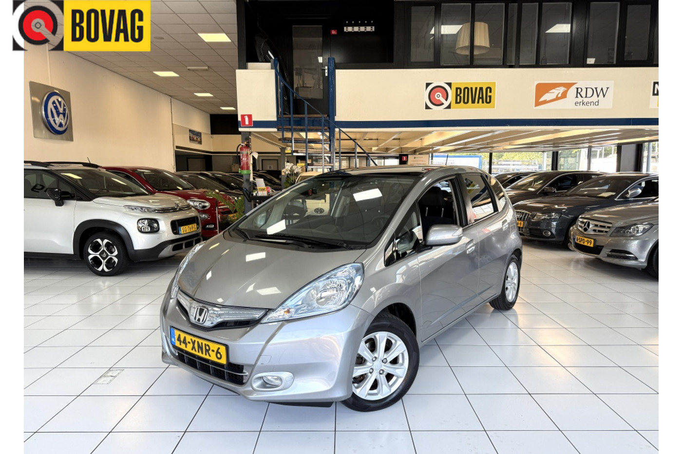 Honda Jazz Hybrid 1.4 Hybrid Elegance Bovag Garantie 2012 - voorkant