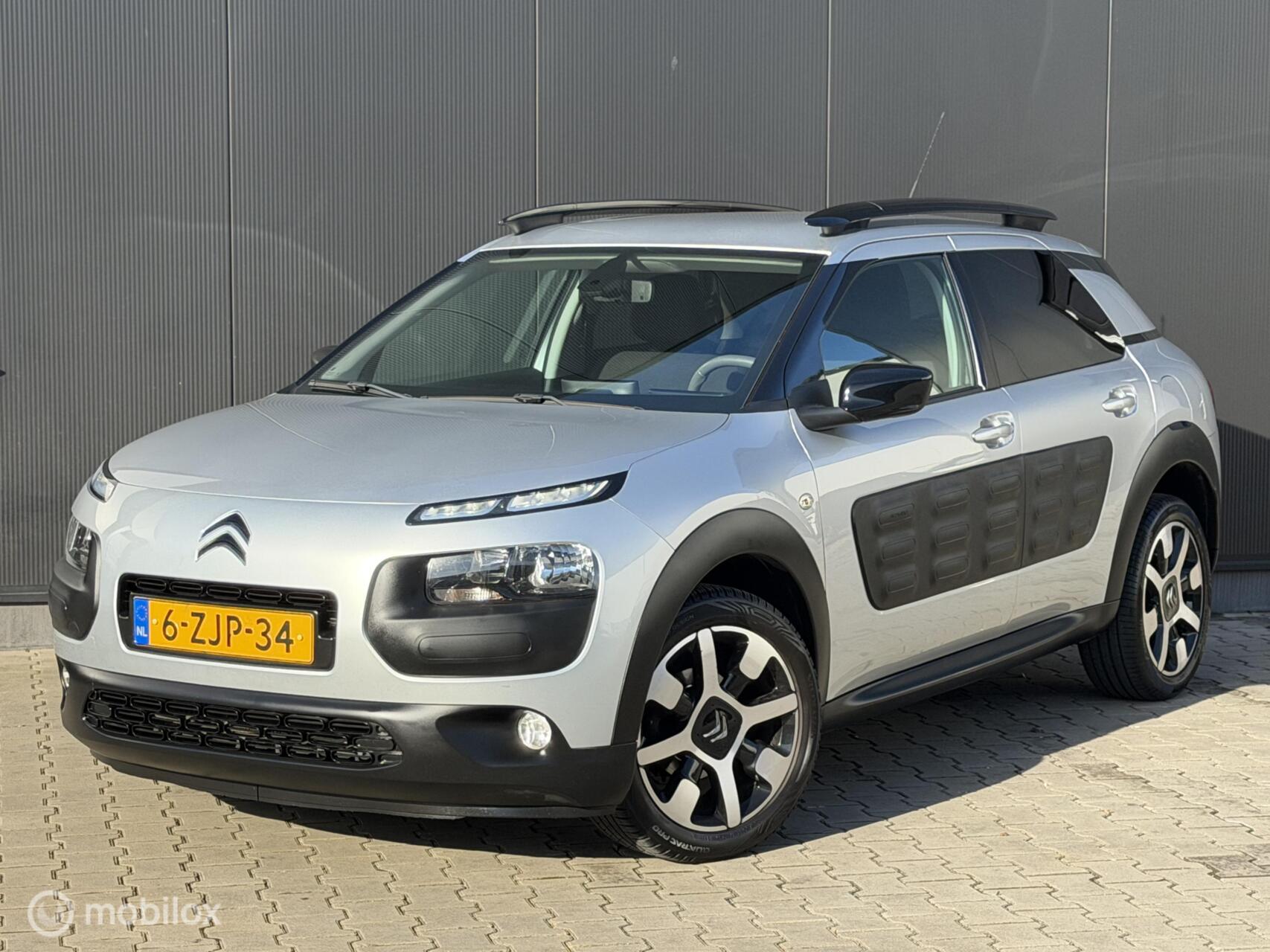 Citroen C4 Cactus 1.2 110PK Shine | CRUISE | NAVI | TREKHAAK | 2015 - voorkant