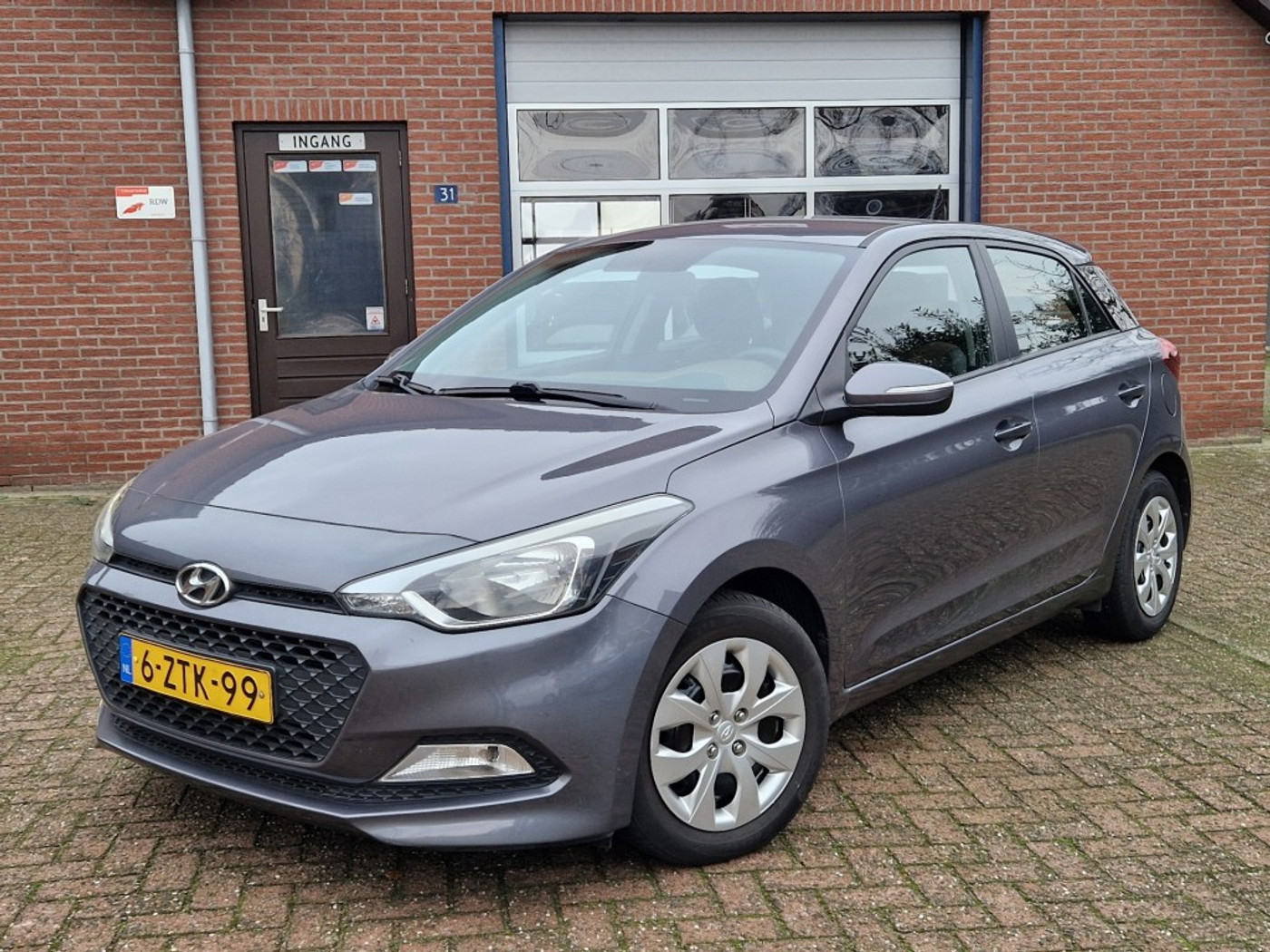 Hyundai I20 1.2i i-Drive Cool 5-Drs Airco NL-auto 2015 - voorkant