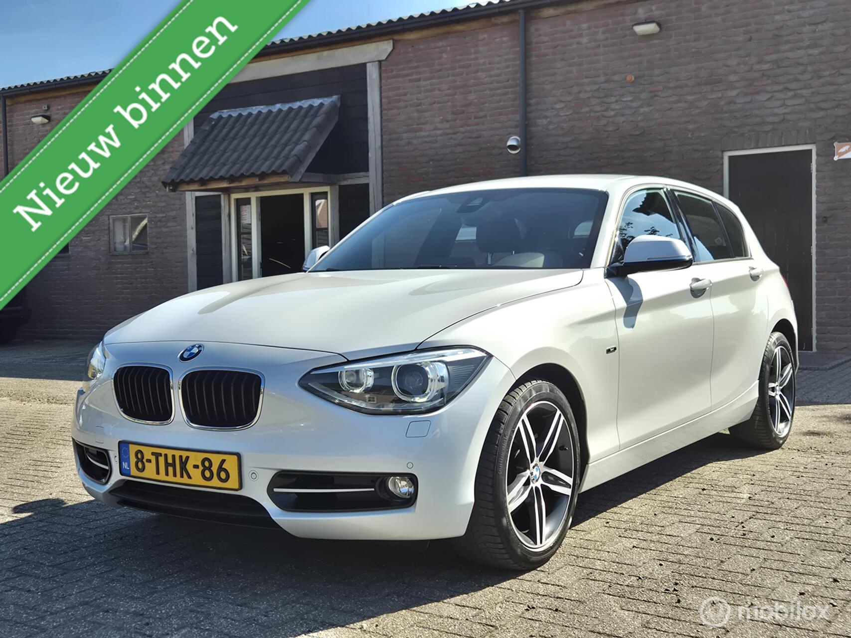 BMW 118i 118i High Executive I Camera I PDC I Trekhaak I HK I Elek stoelen 2014 - voorkant