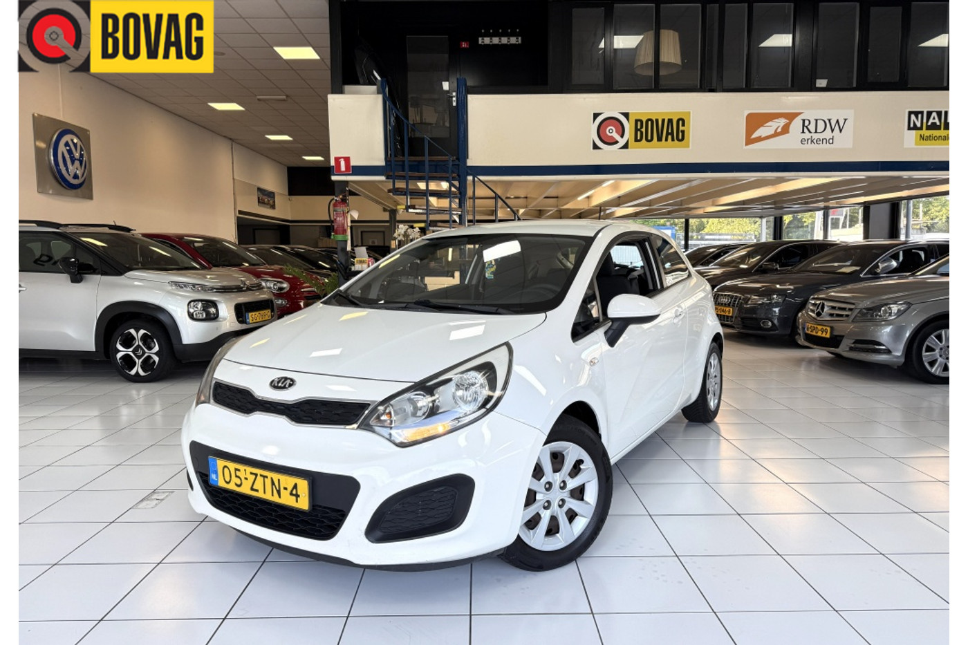 Kia Rio 1.2 CVVT Comf. Pack Bovag Garantie Airco 2013 - voorkant