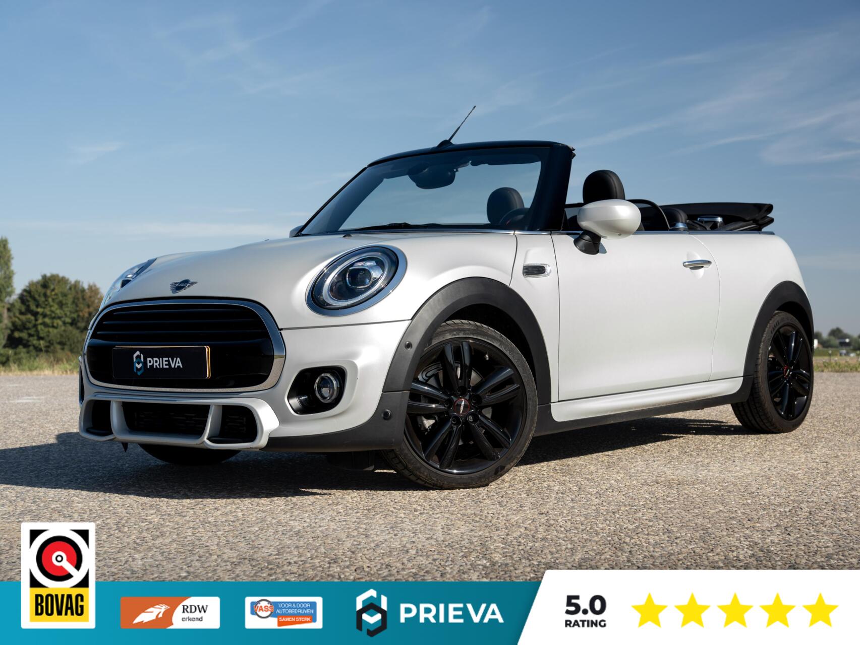 Mini Cooper MINI Cooper Cabrio 1.5 136pk Automaat | JCW Trim | 23.500 KM | Leder | CarPlay | Comfort Access | Dealer 2020 - voorkant