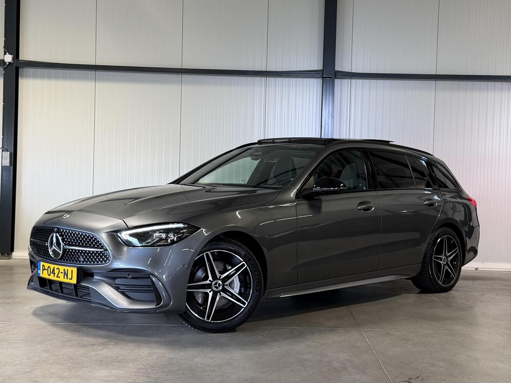 Mercedes-Benz C-klasse 300 e AMG Line Pano Sfeer Leer NAP 2022 - voorkant