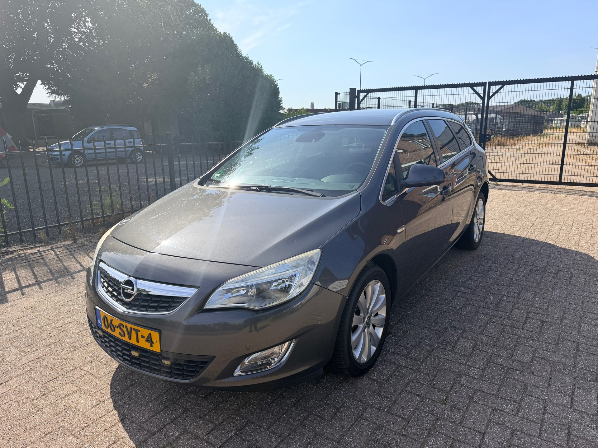Opel Astra Sports Tourer 1.4 Turbo Cosmo 2011 - voorkant