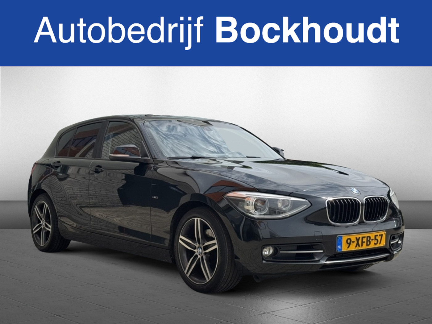 BMW 118i 118i Executive | Navi | Stoelverwarming 2013 - voorkant