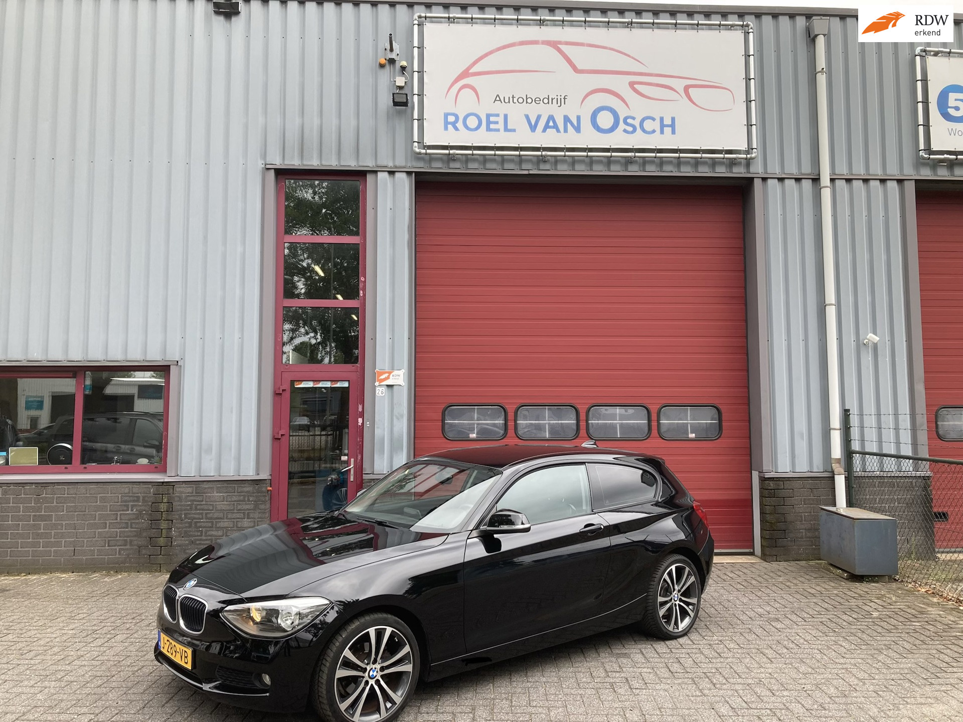 BMW 116i 116i Executive Sport Automaat Navi PDC 2014 - voorkant