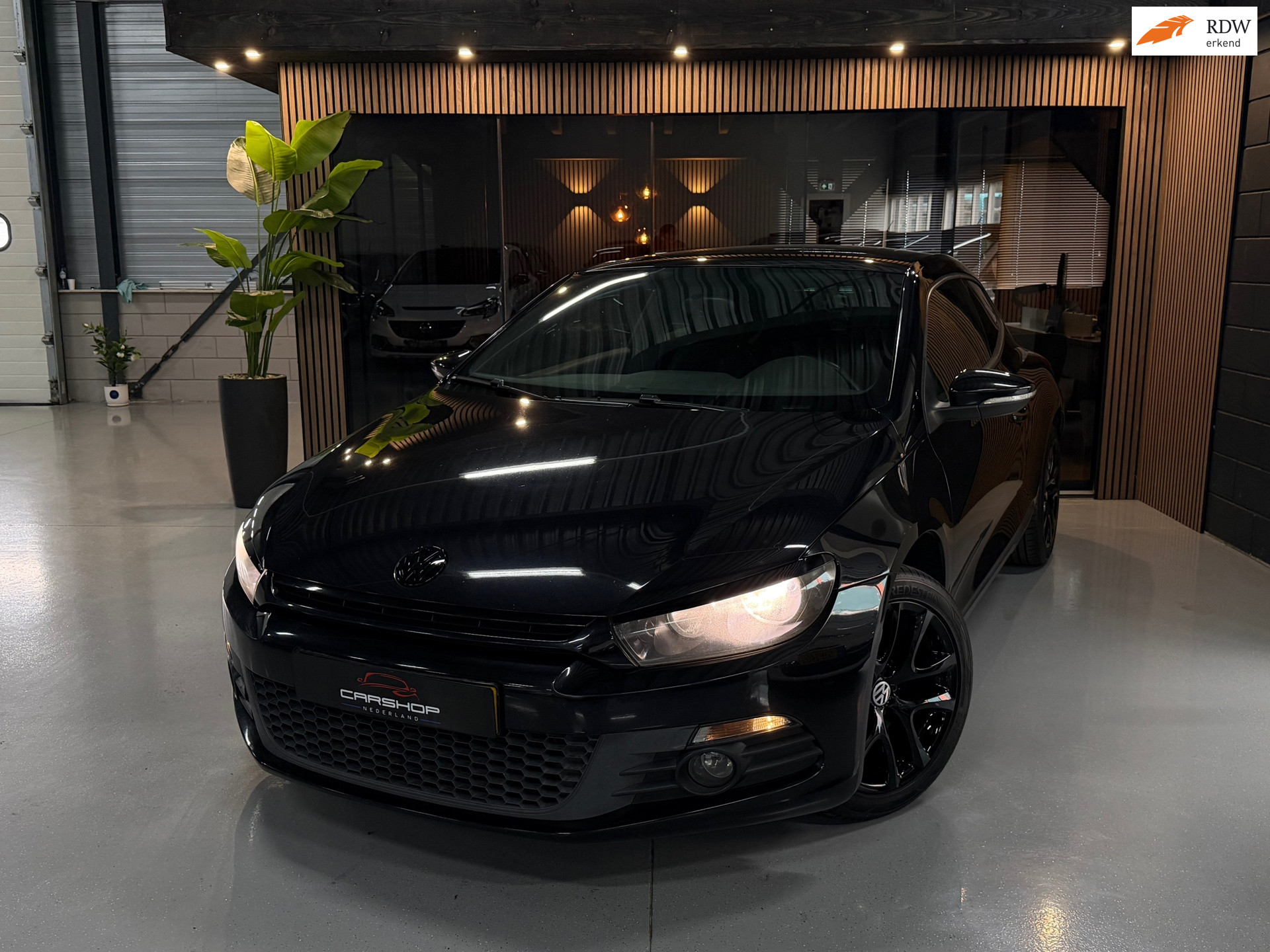 Volkswagen Scirocco 1.4 TSI 160PK Highline CARPLAY/PDC/AIRCO 2009 - voorkant