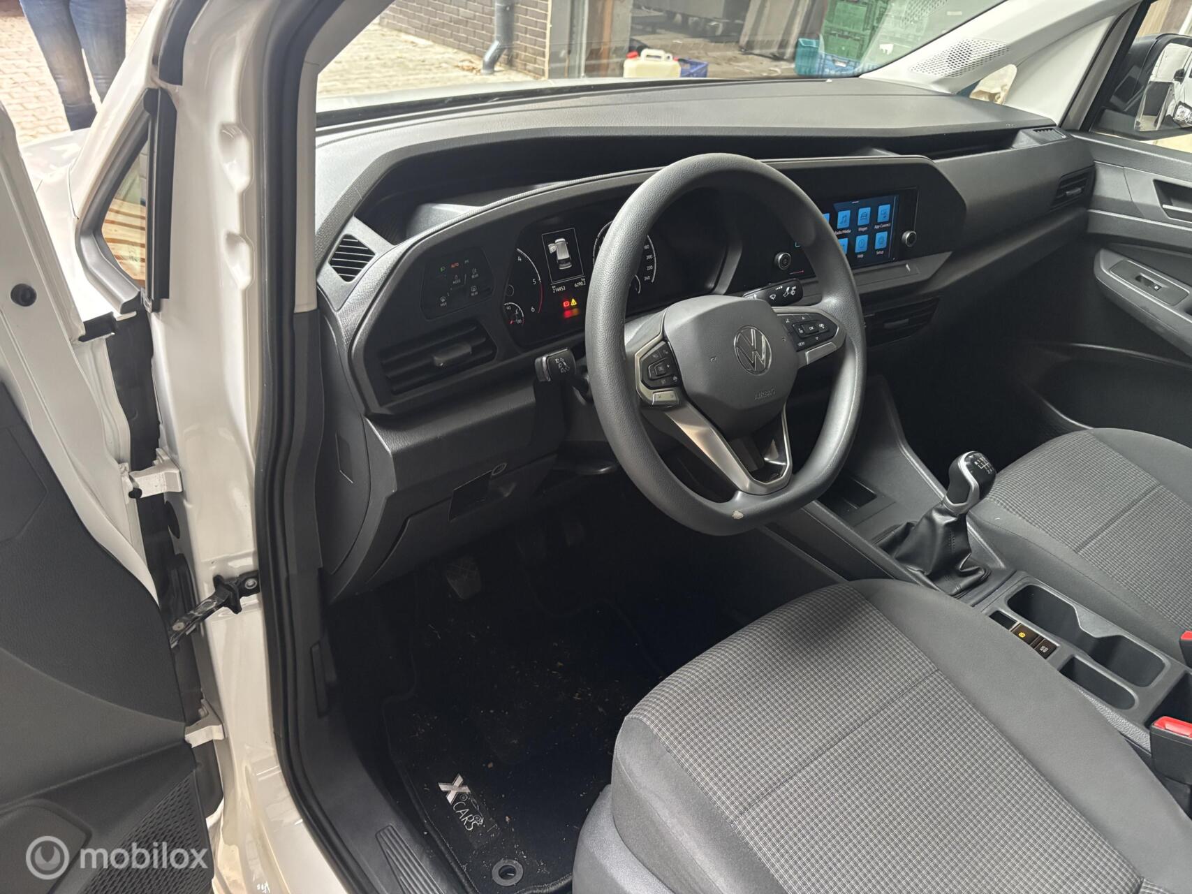 Foto van Volkswagen Caddy Modified Partition Wall
