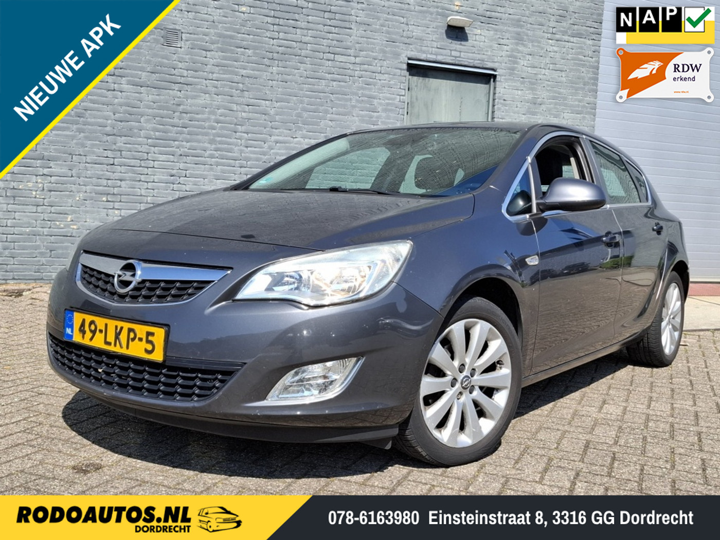 Opel Astra 1.4 Cosmo 5Drs Ecc/Cruise/Nw APK ✅ 2010 - voorkant