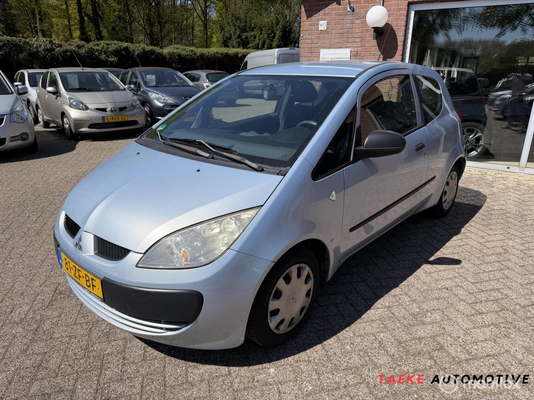 Mitsubishi Mitsubishi Colt 1.1 Incharge Airco/Lees tekst 2008 - voorkant