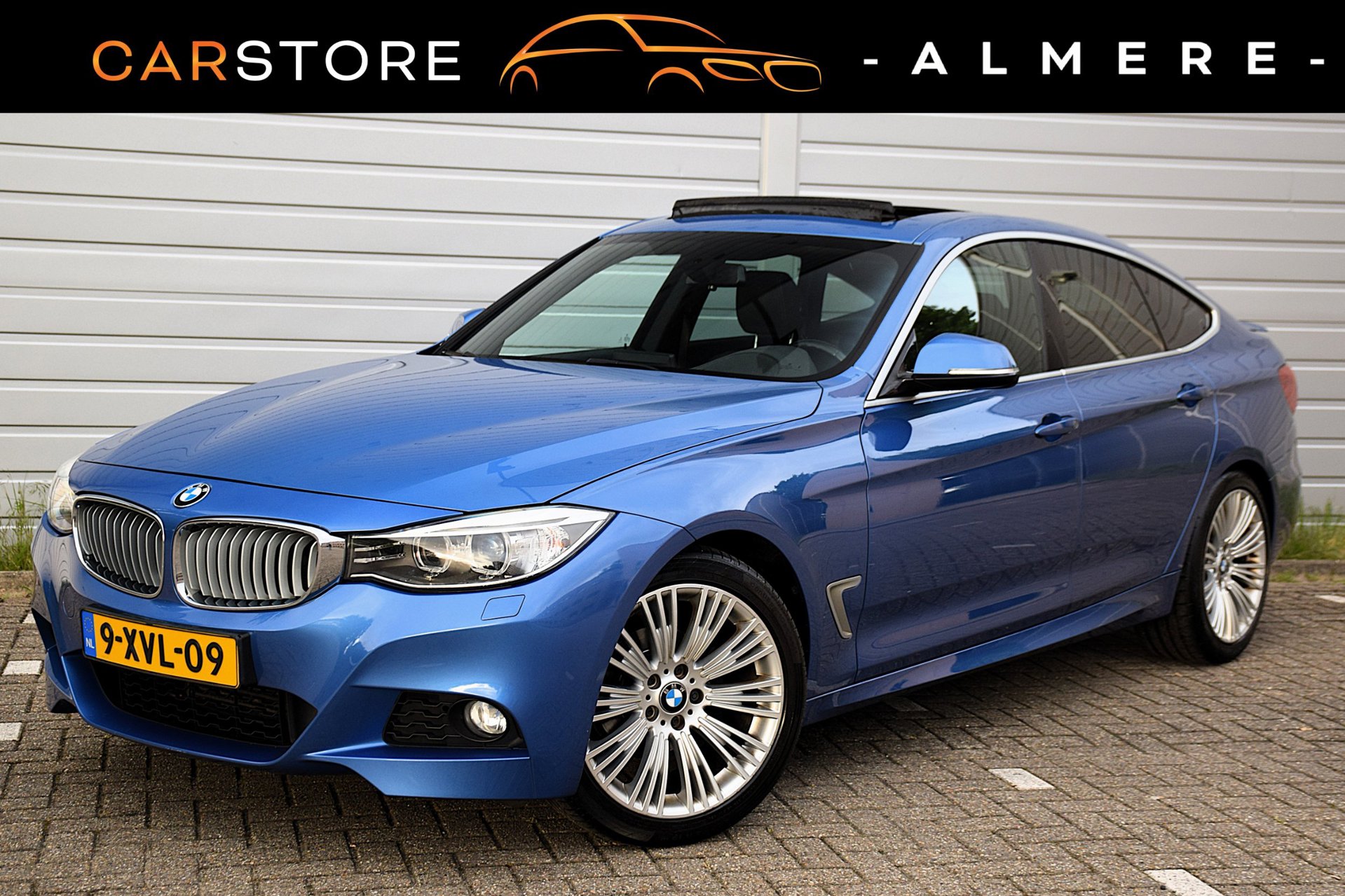 BMW 320i 320i Executive*M-Pakket*Automaat*Clima*NL Auto*2e eigenaar* 2014 - voorkant