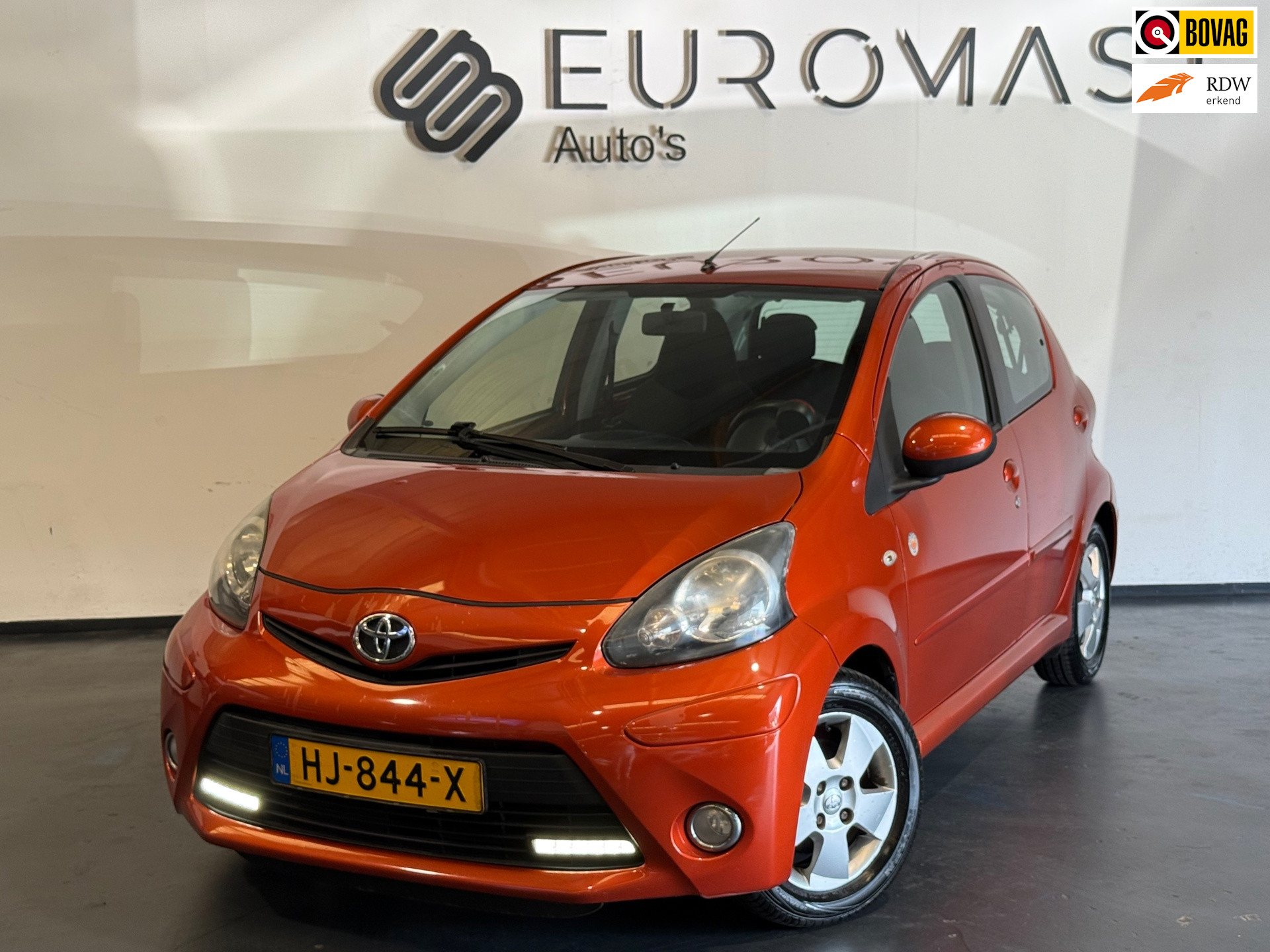 Toyota Toyota Aygo 1.0 VVT-i Comfort Orange Airco 5d Elektrische Ramen Nieuwe Apk 2012 - voorkant