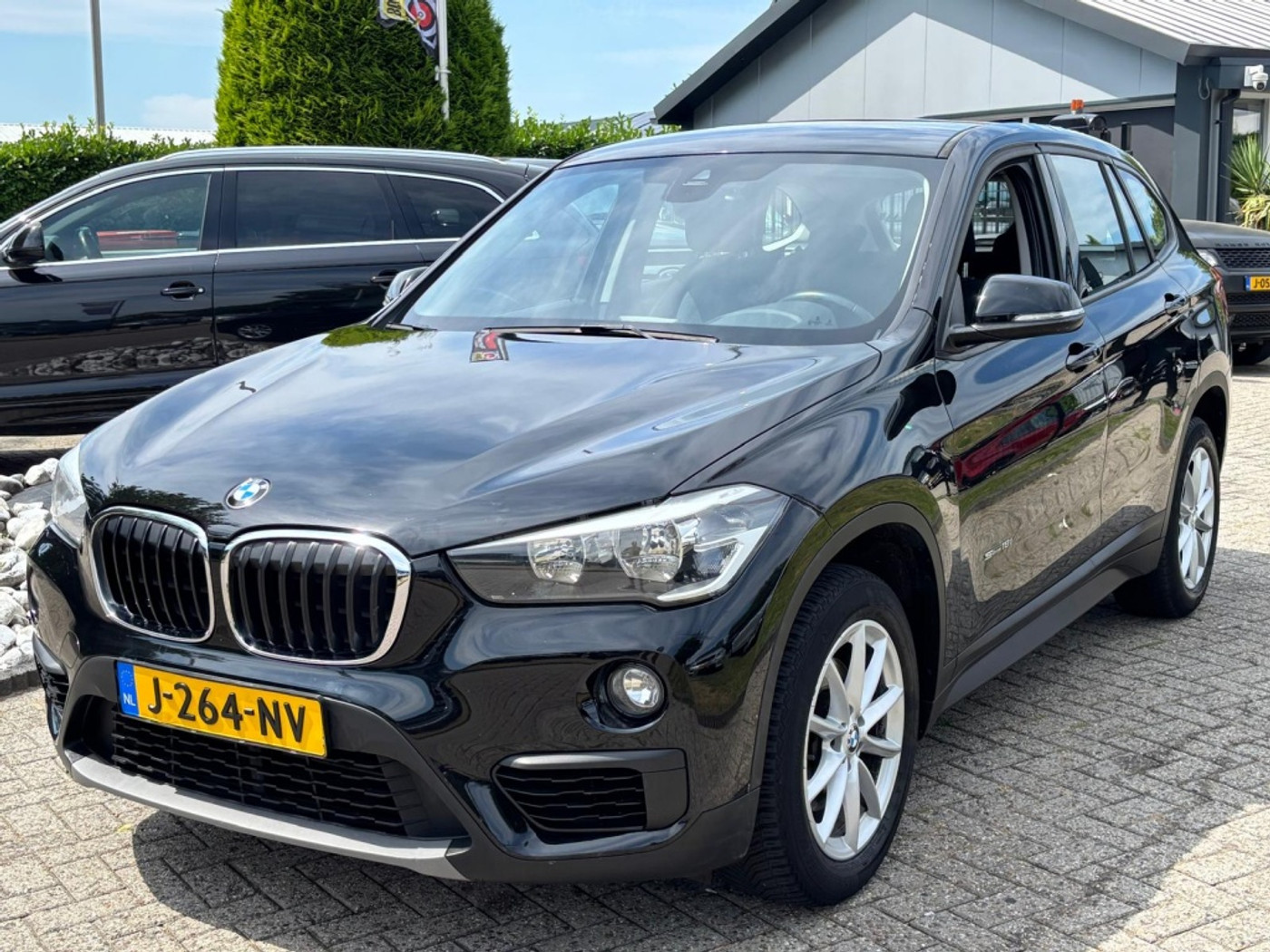 BMW X1 Sdrive18i 1.8I Benzine 2017 Zwart Automaat Nieuw Model 2017 - voorkant