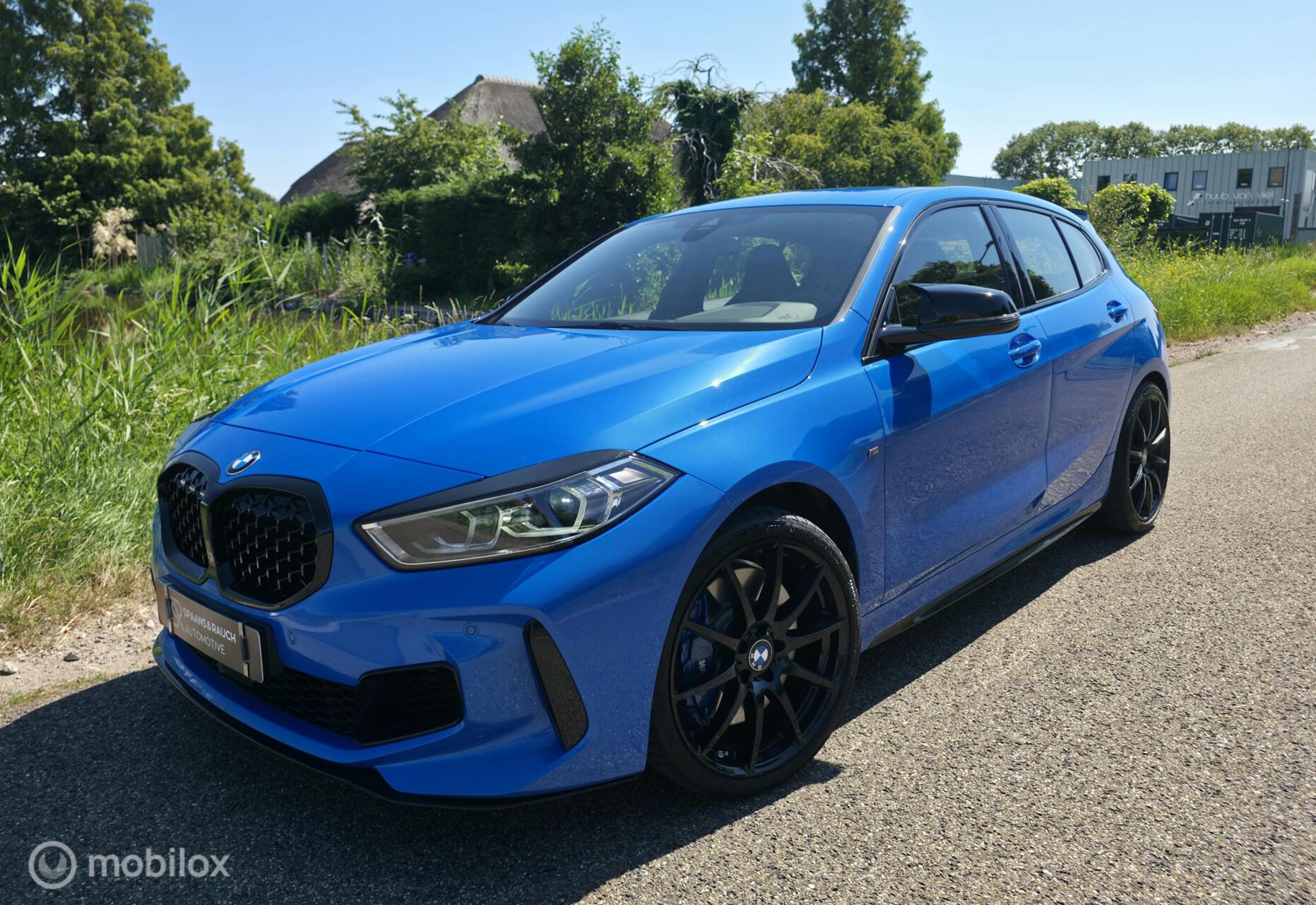 BMW 1-serie M135i xDrive High Executive 19Dkm/2021/ 2021 - voorkant