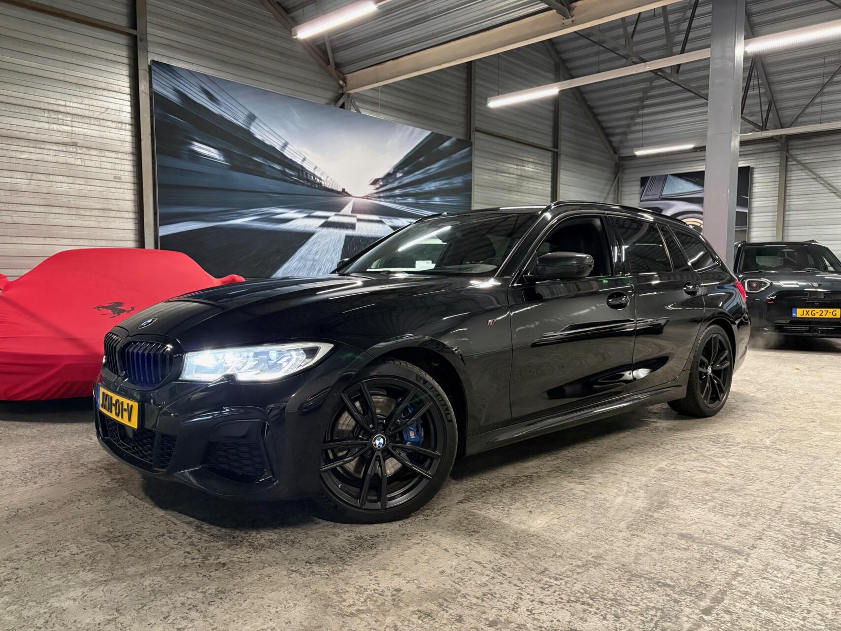 BMW 3-serie Touring M340i xD High Executive|Laser|HUD|422PK/566Nm 2021 - voorkant