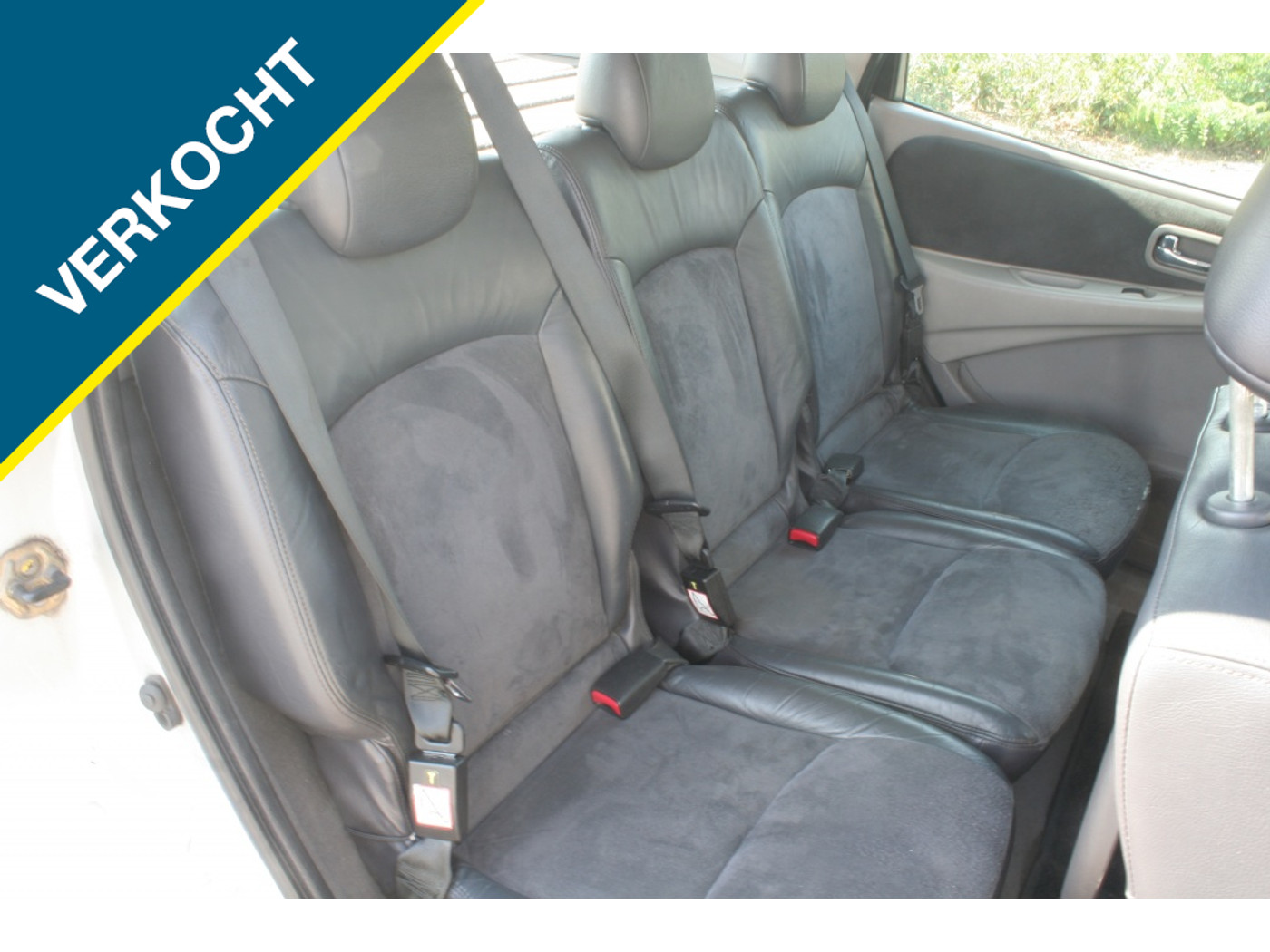 Foto van Nissan Almera Tino