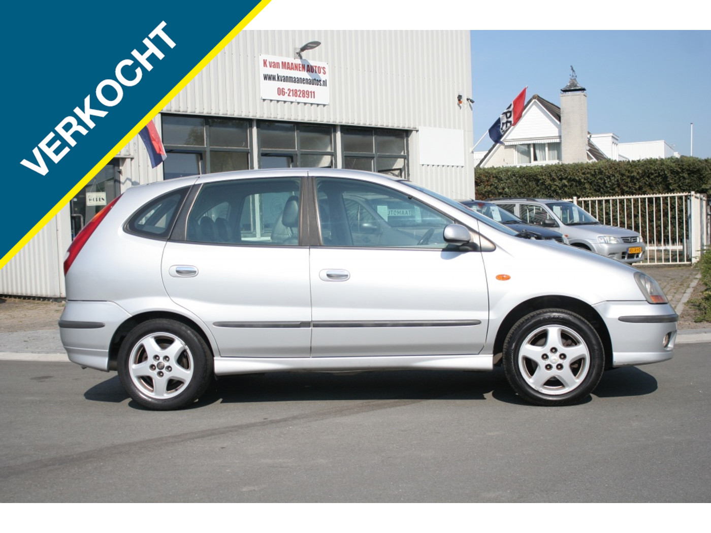 Foto van Nissan Almera Tino