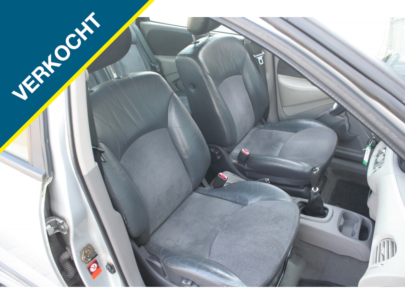 Foto van Nissan Almera Tino