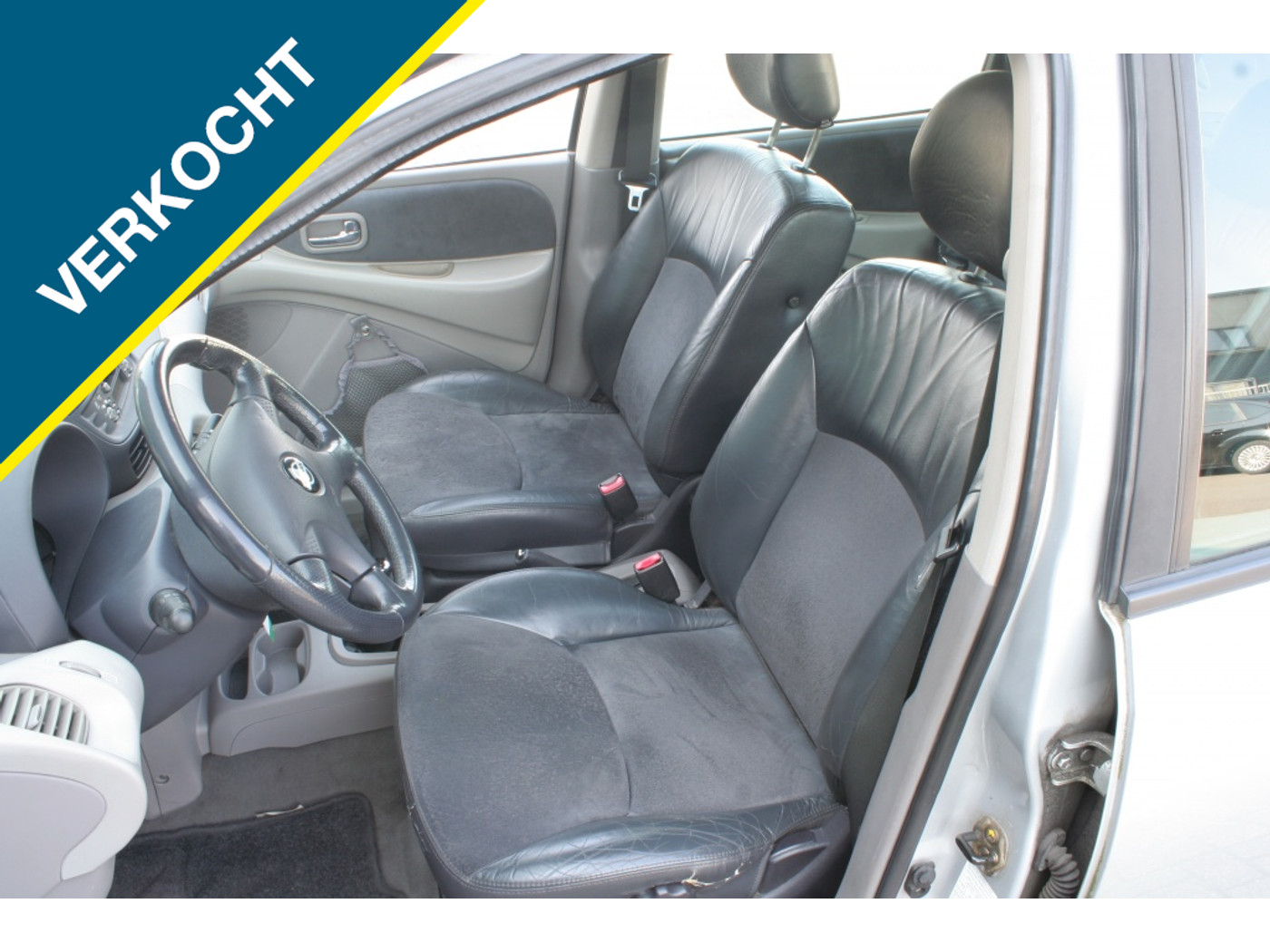 Foto van Nissan Almera Tino