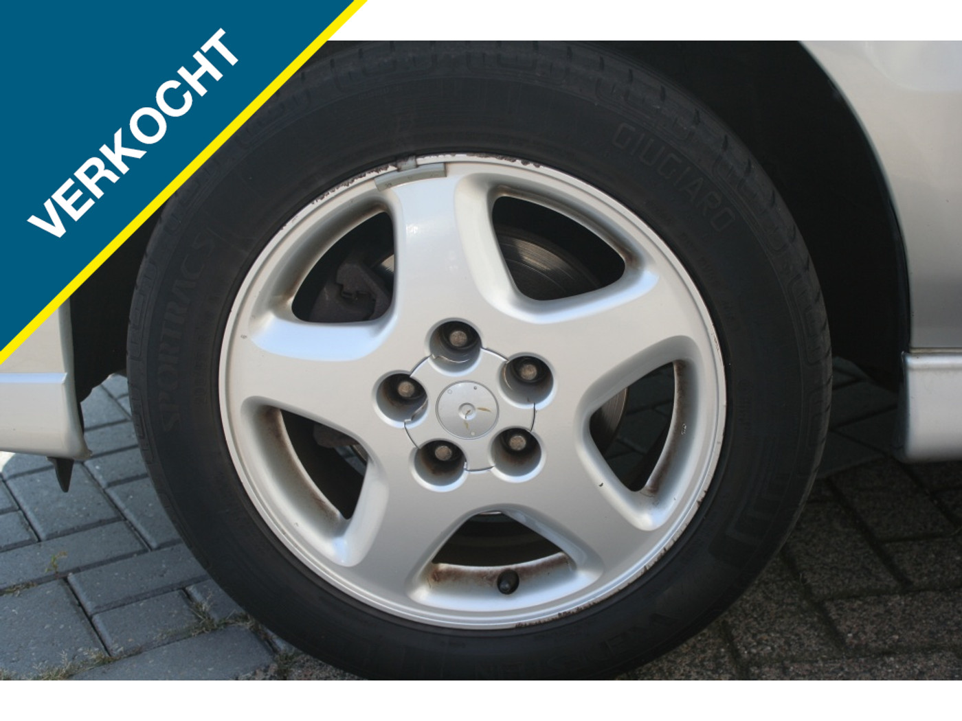 Foto van Nissan Almera Tino