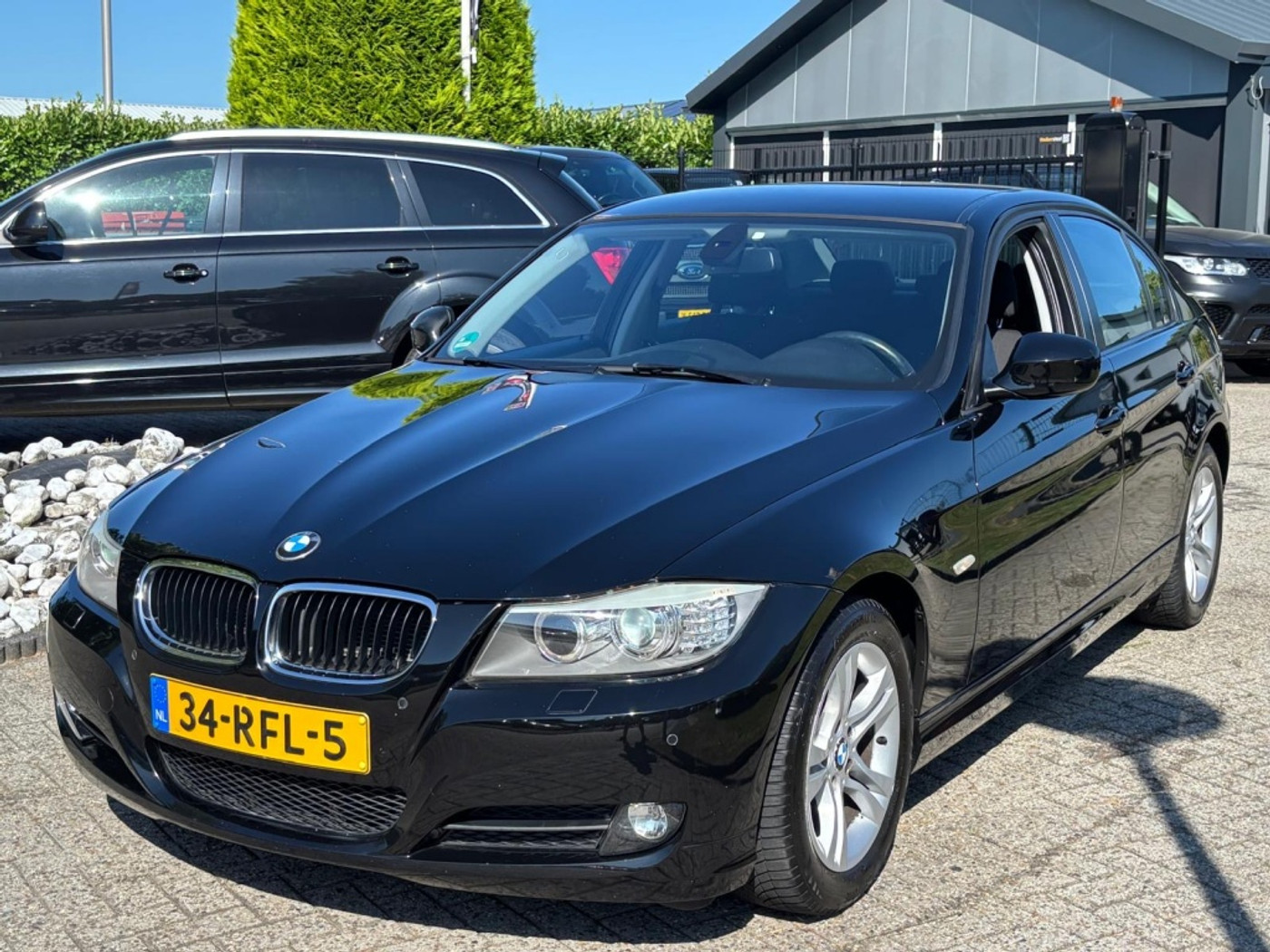 BMW 318i 318i Sedan Executive 2011 Zwart NL Auto 2011 - voorkant