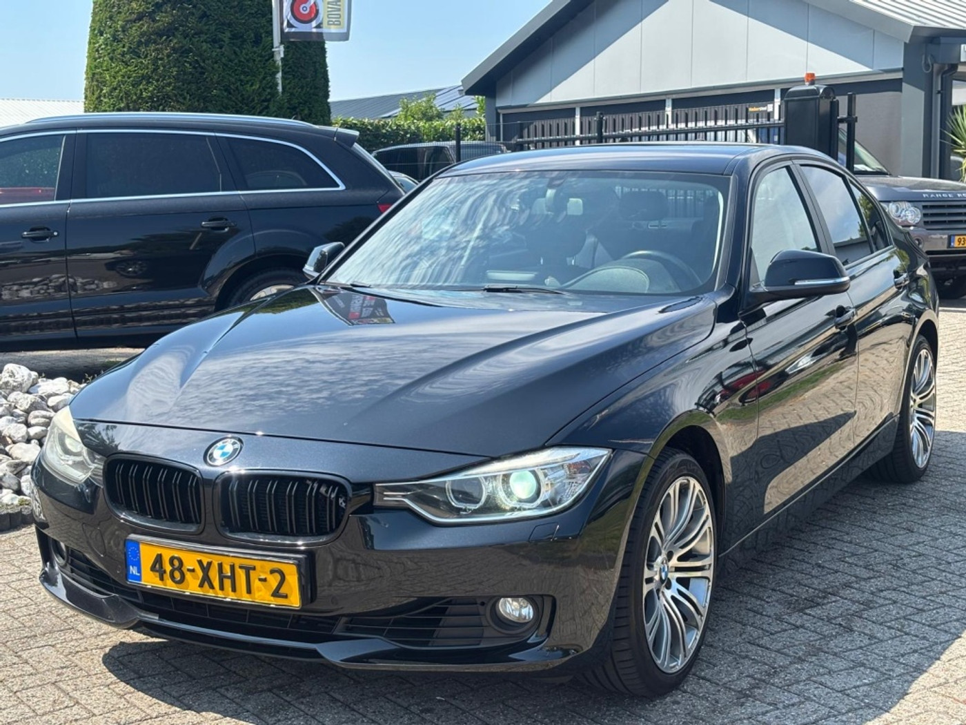 BMW 3er Reihe 320i High Executive Sport Automaat 2012 Xenon 2012 - voorkant